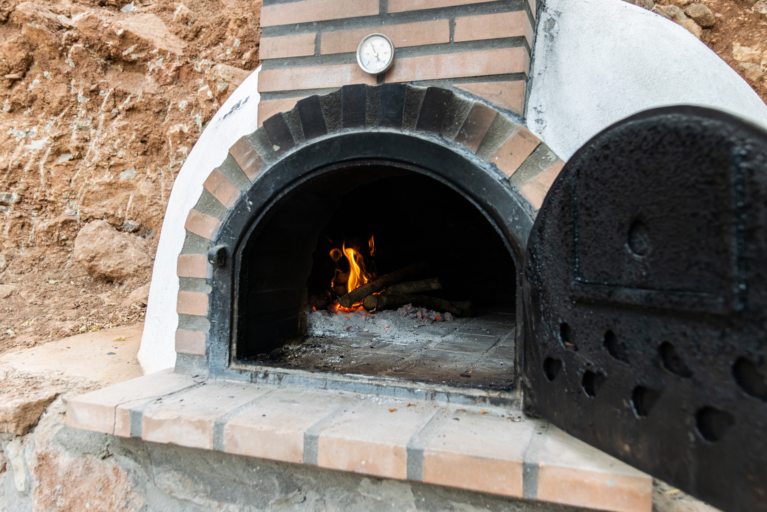 Outdoor DIY brick pizza oven.