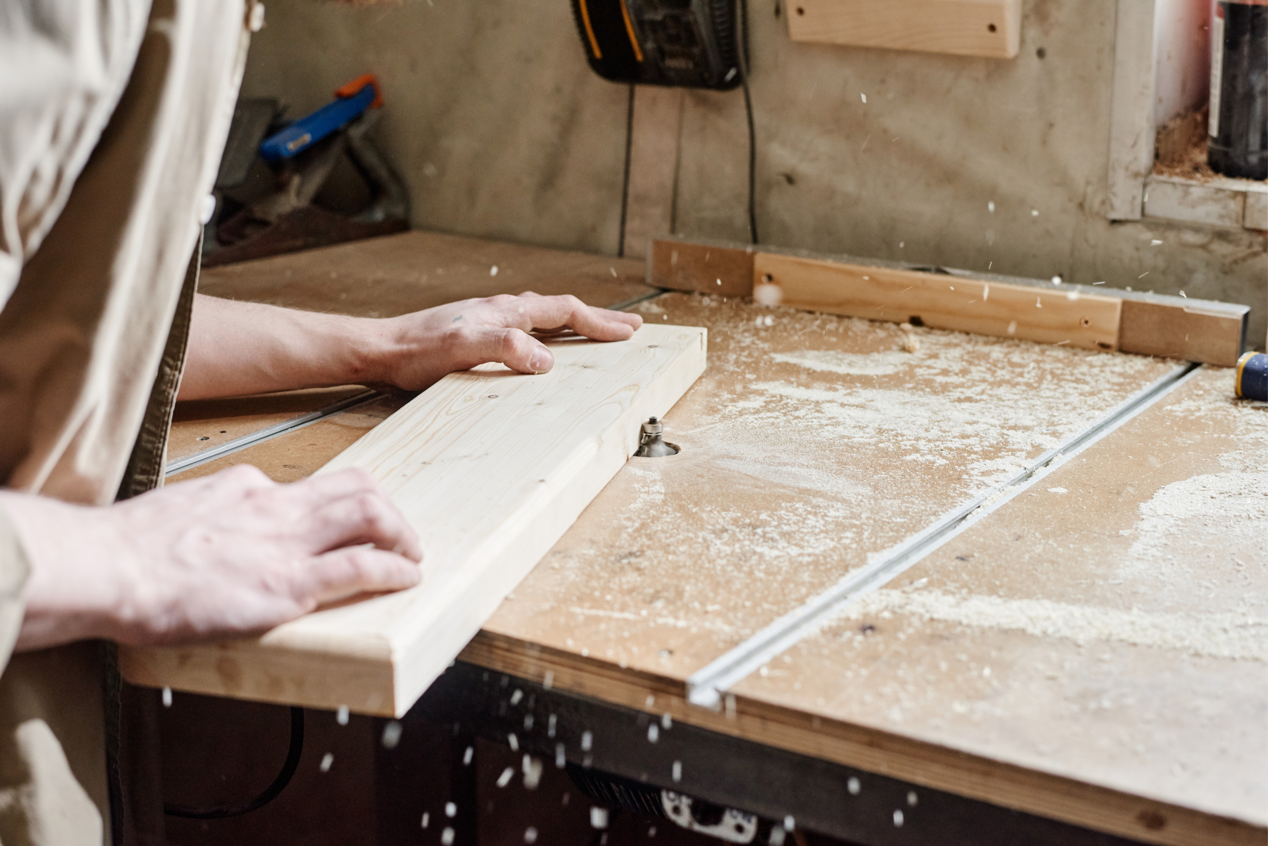 DIY router table being used to work on wood.