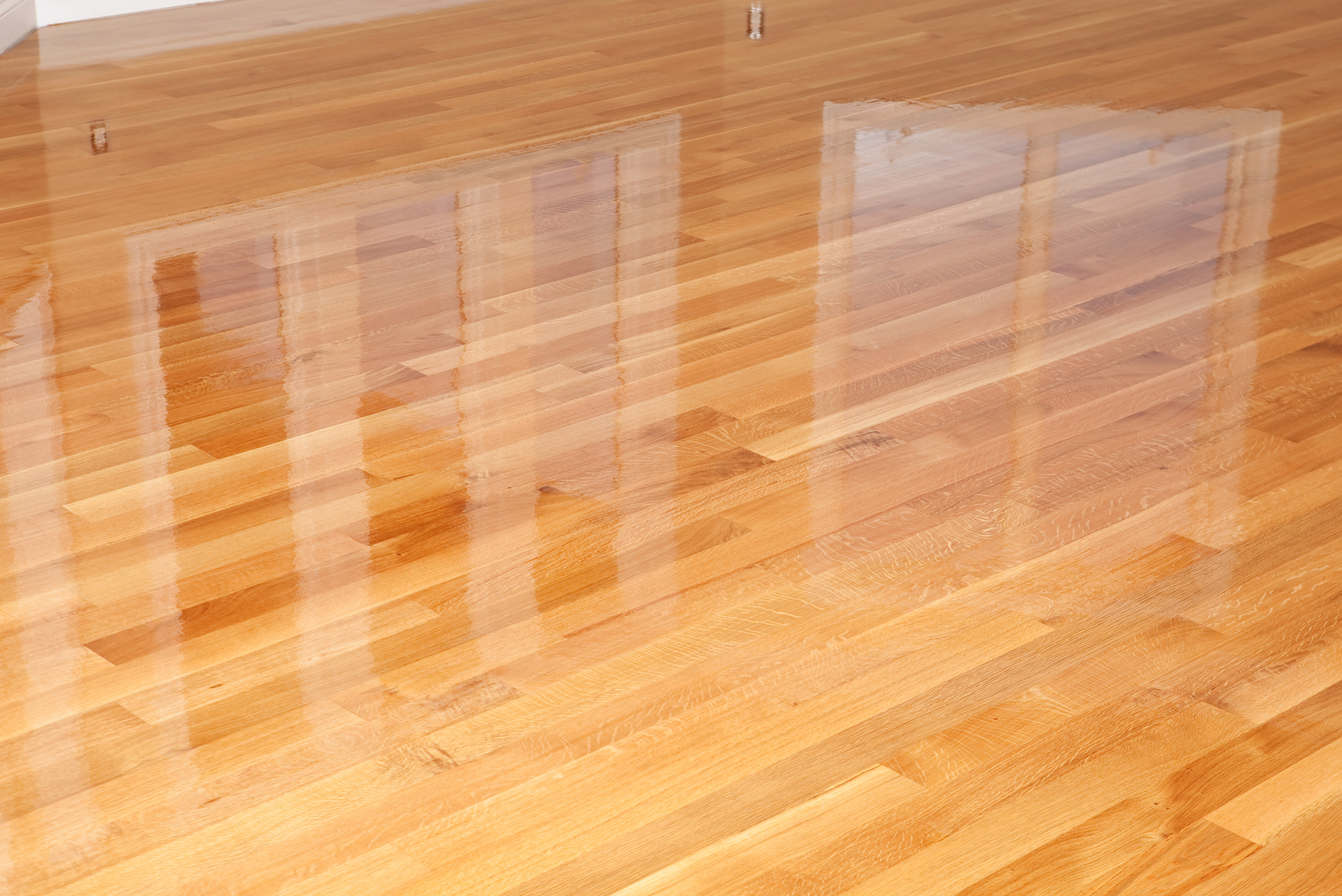 A polyurethane finished wooden floor.