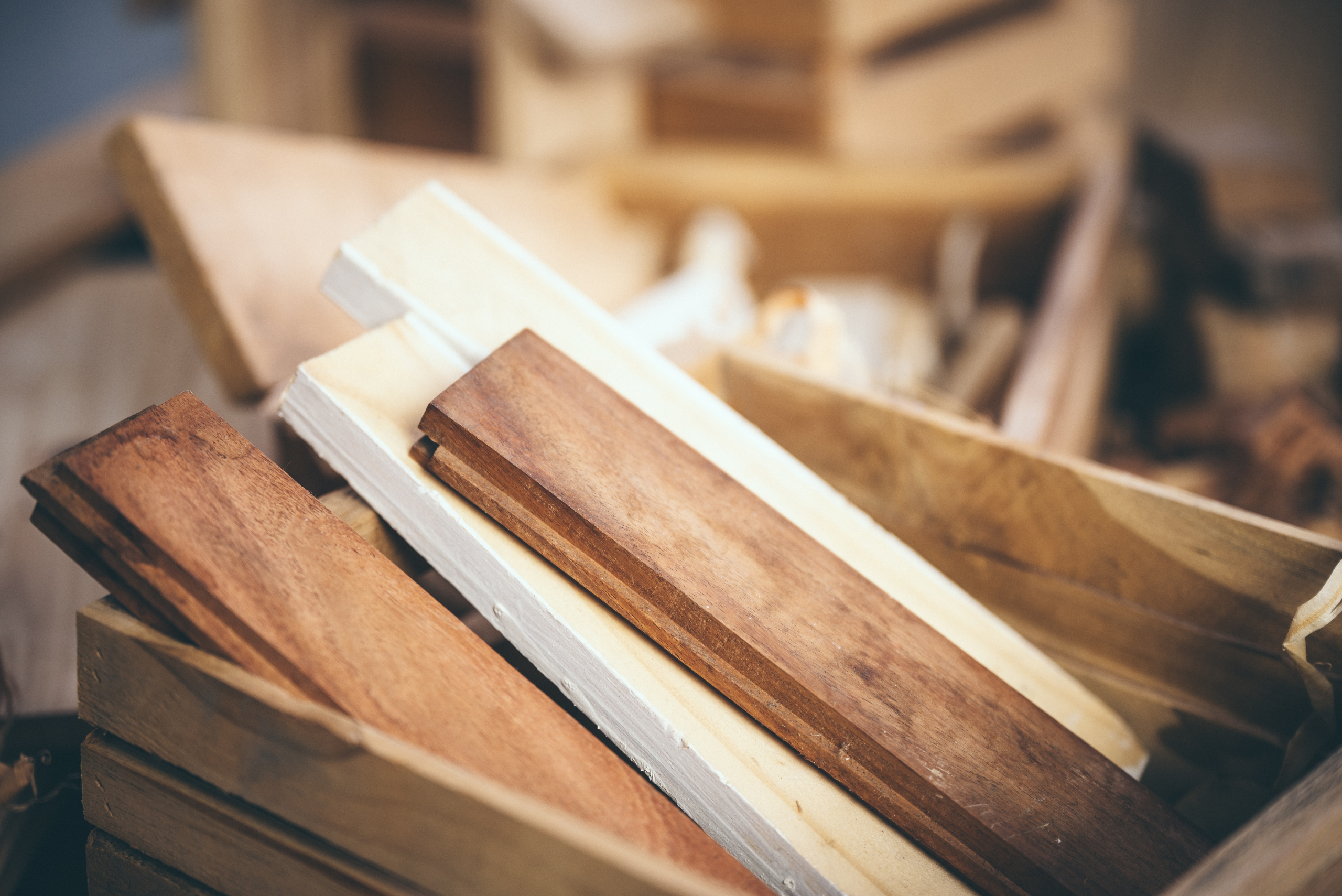 Wooden box with wood building supplies.