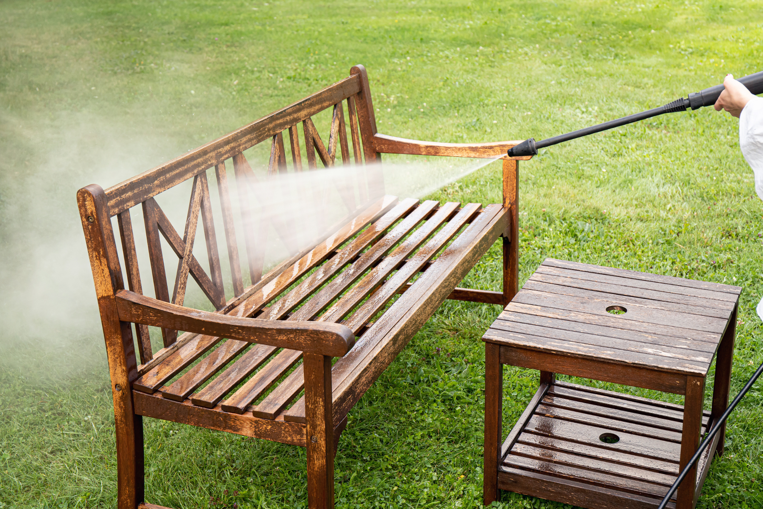 Spraying outdoor bench.