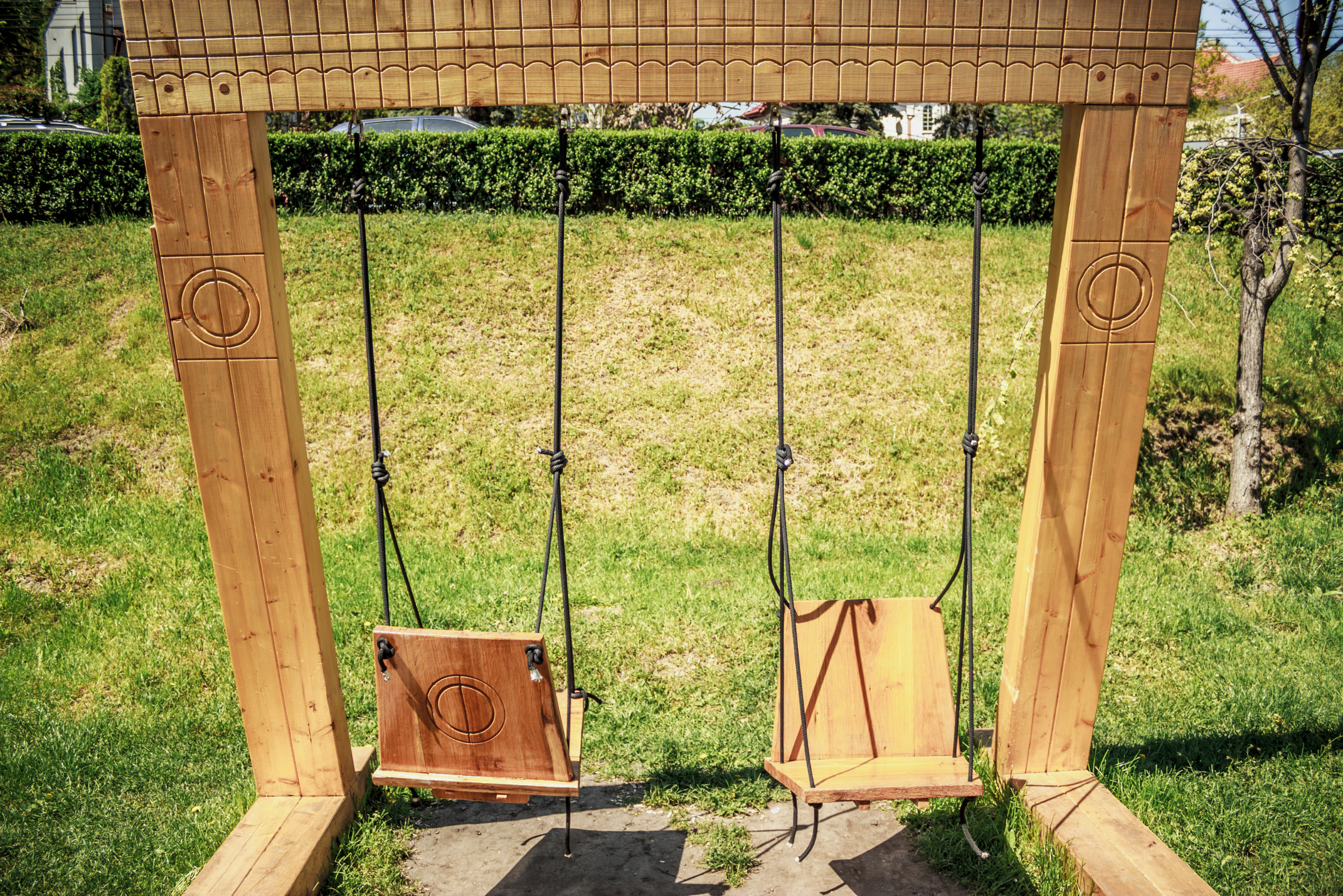 A wooden swing set.