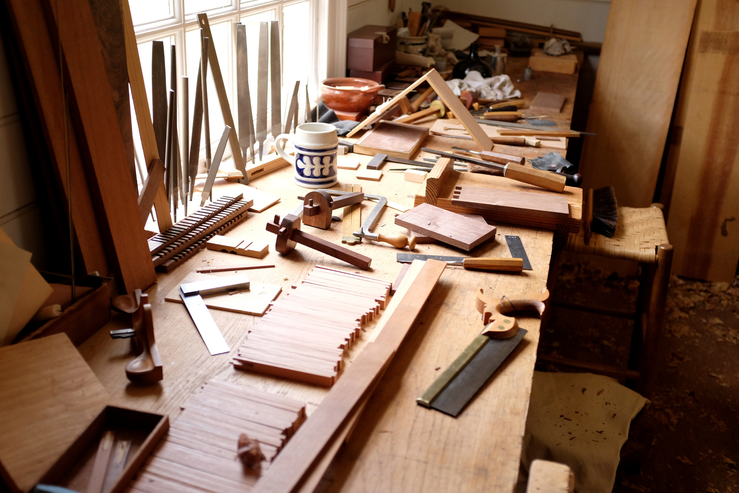 An assortment of materials and tools in a workshop.