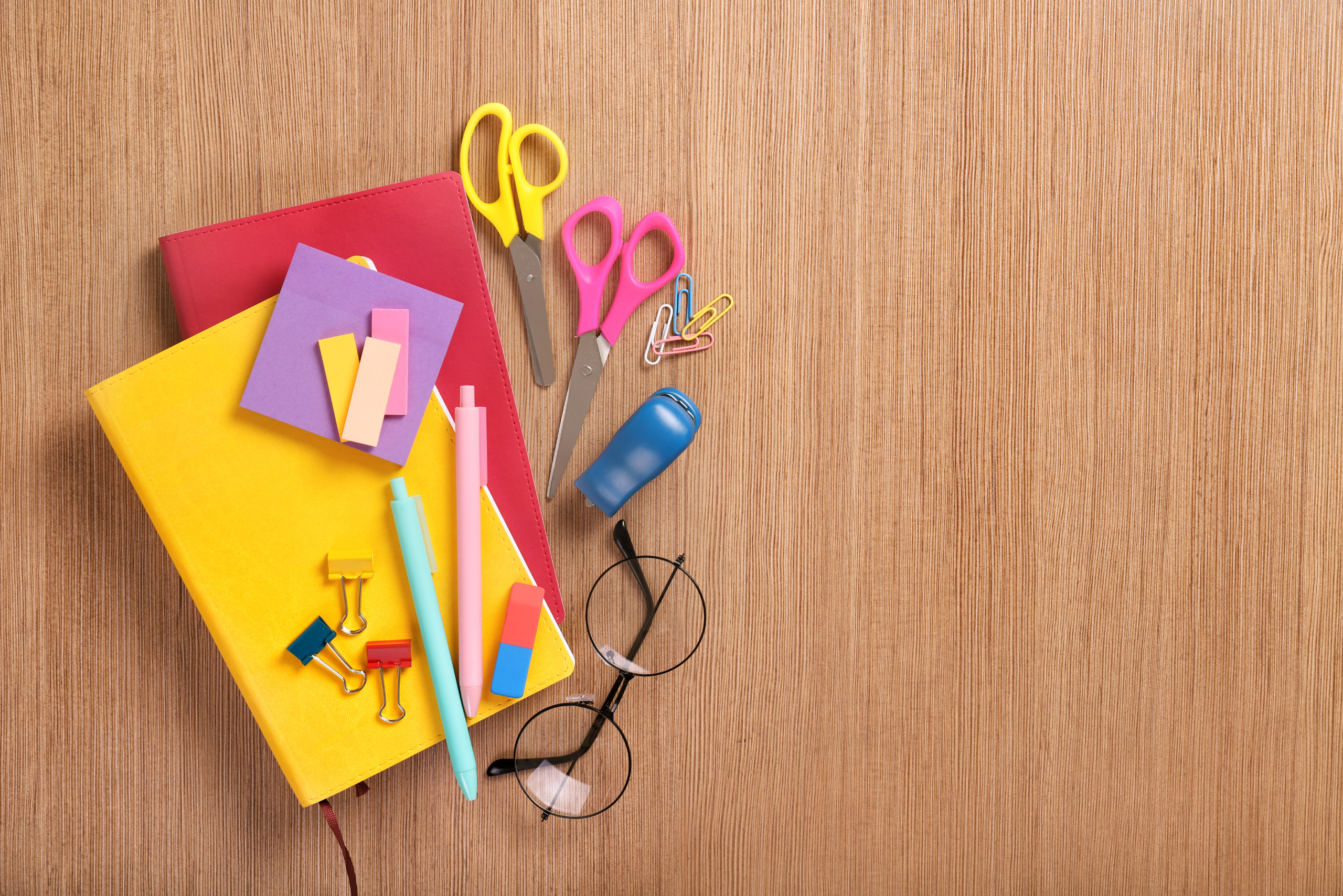 A selection of items and materials for creating a DIY busy board.