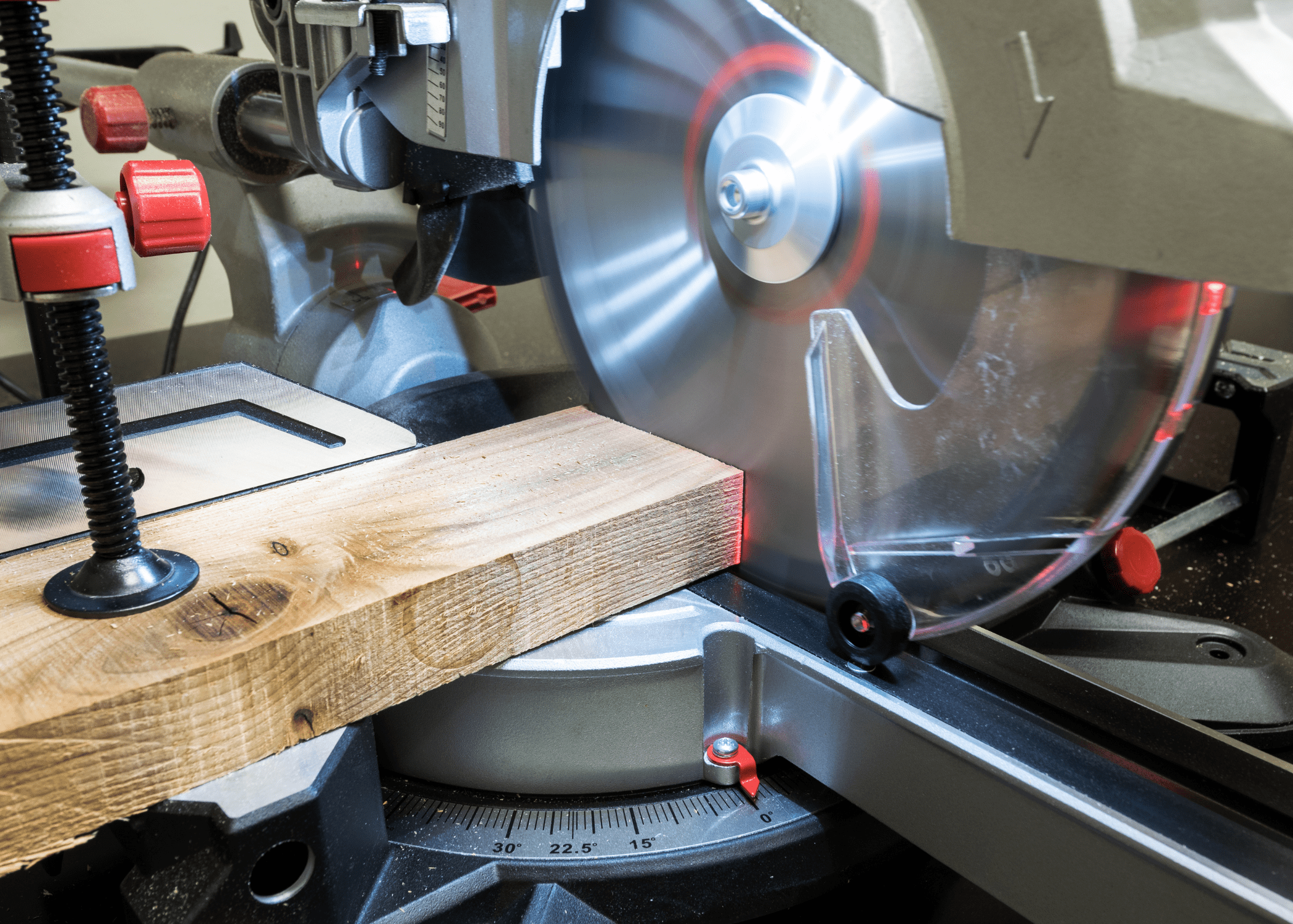 close up of a miter saw cutting