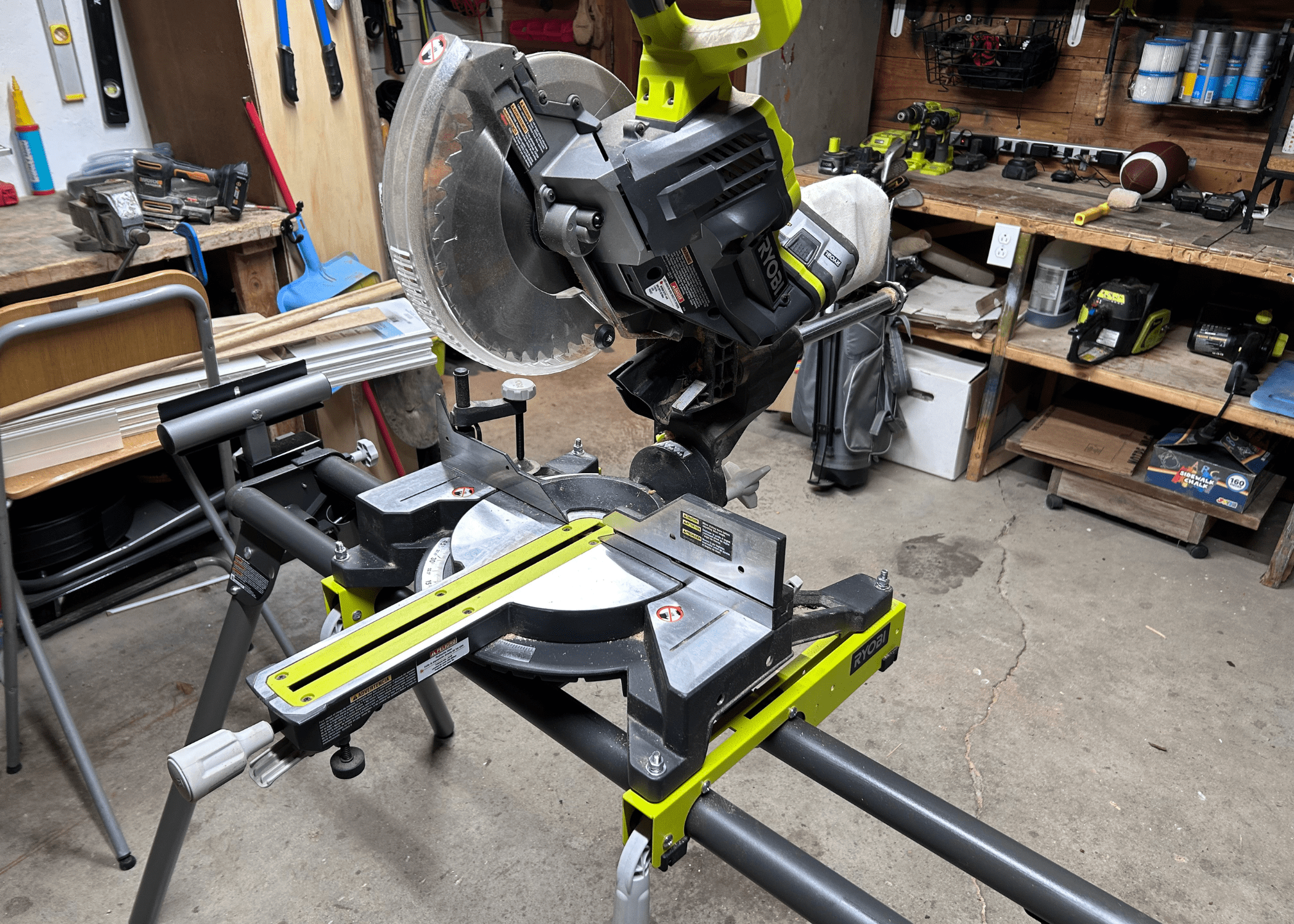 miter saw on a stand in a workshop