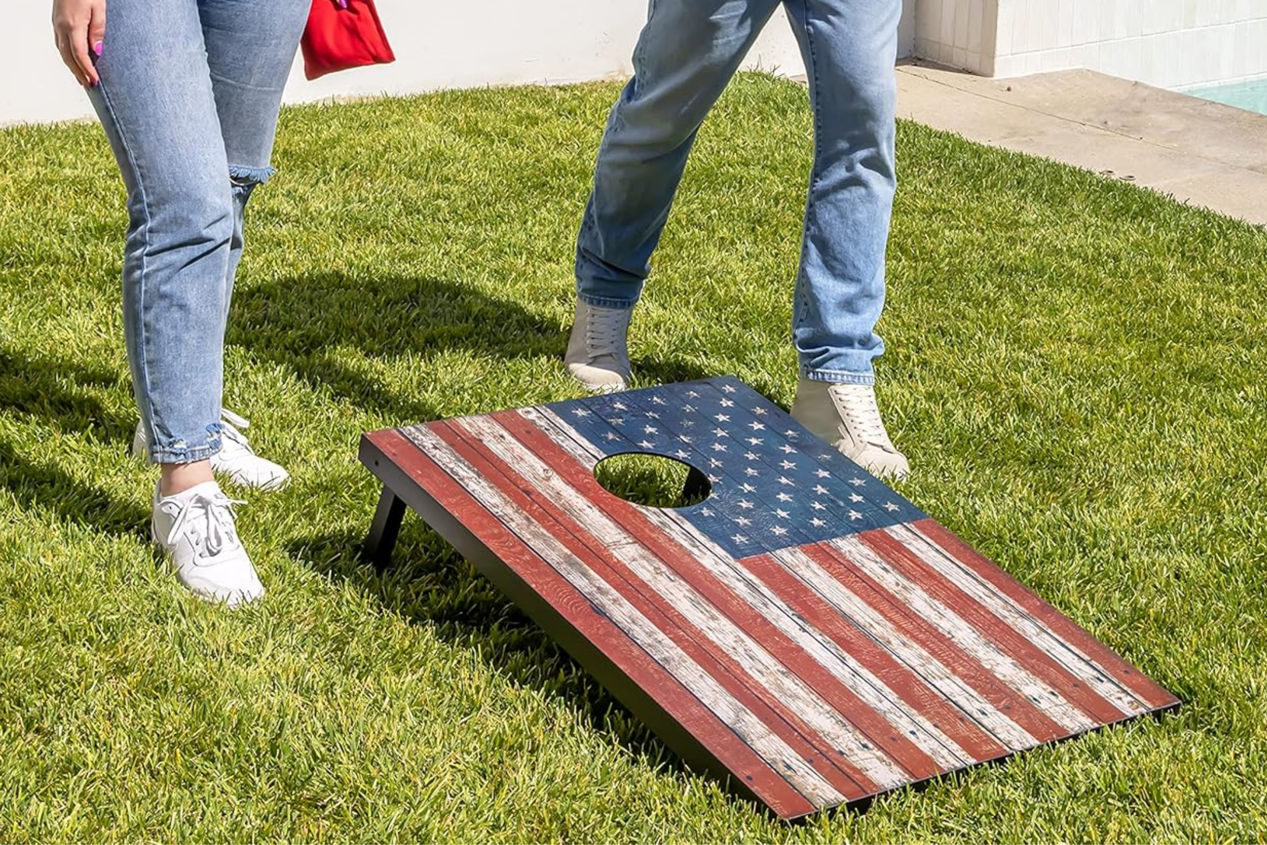 A cornhole with American flag design.