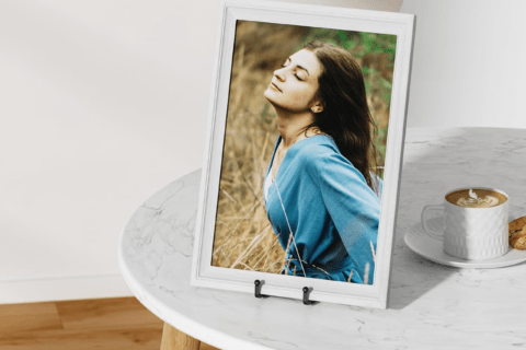 A picture frame with a woman's photo.