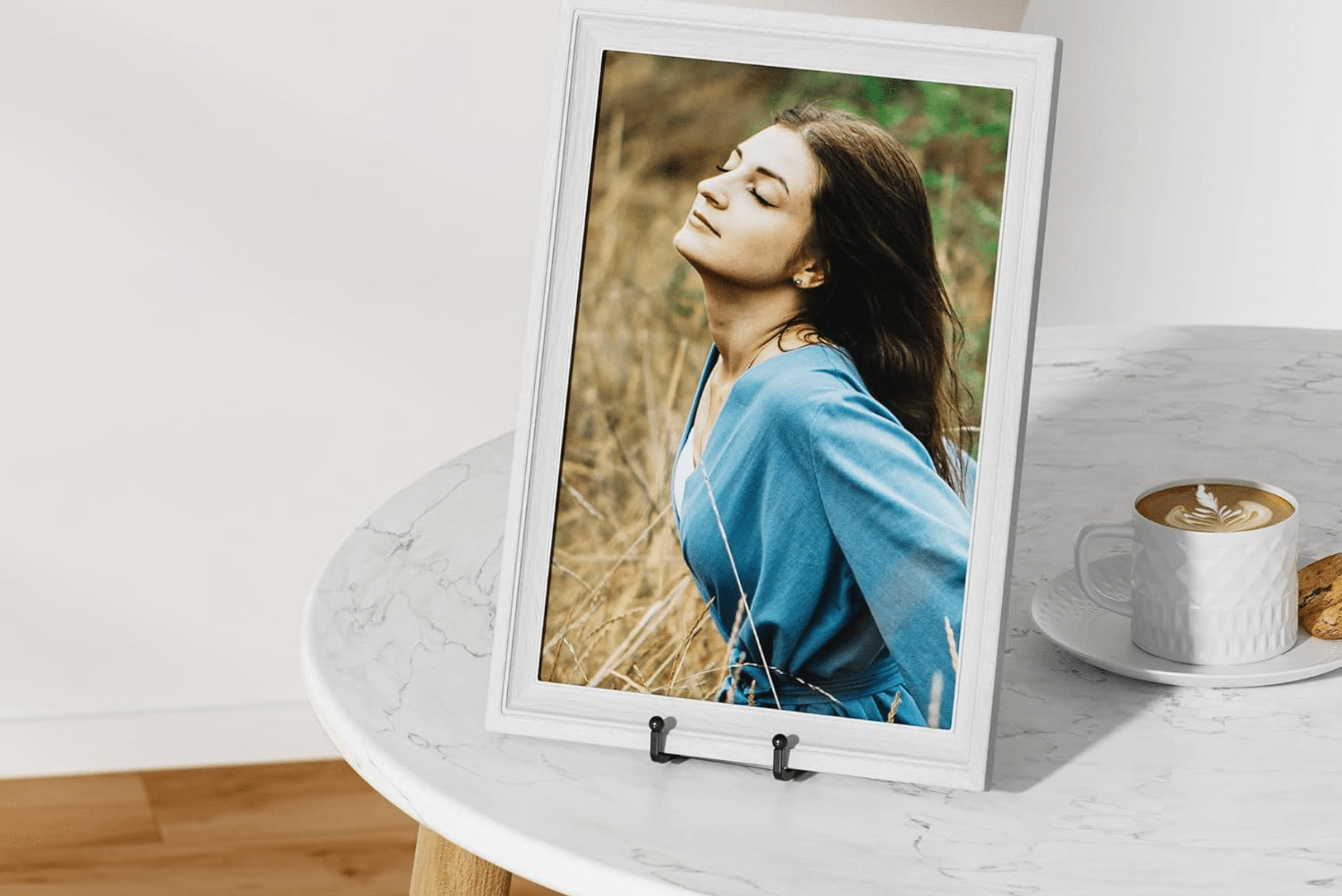 A picture frame with a woman's photo.