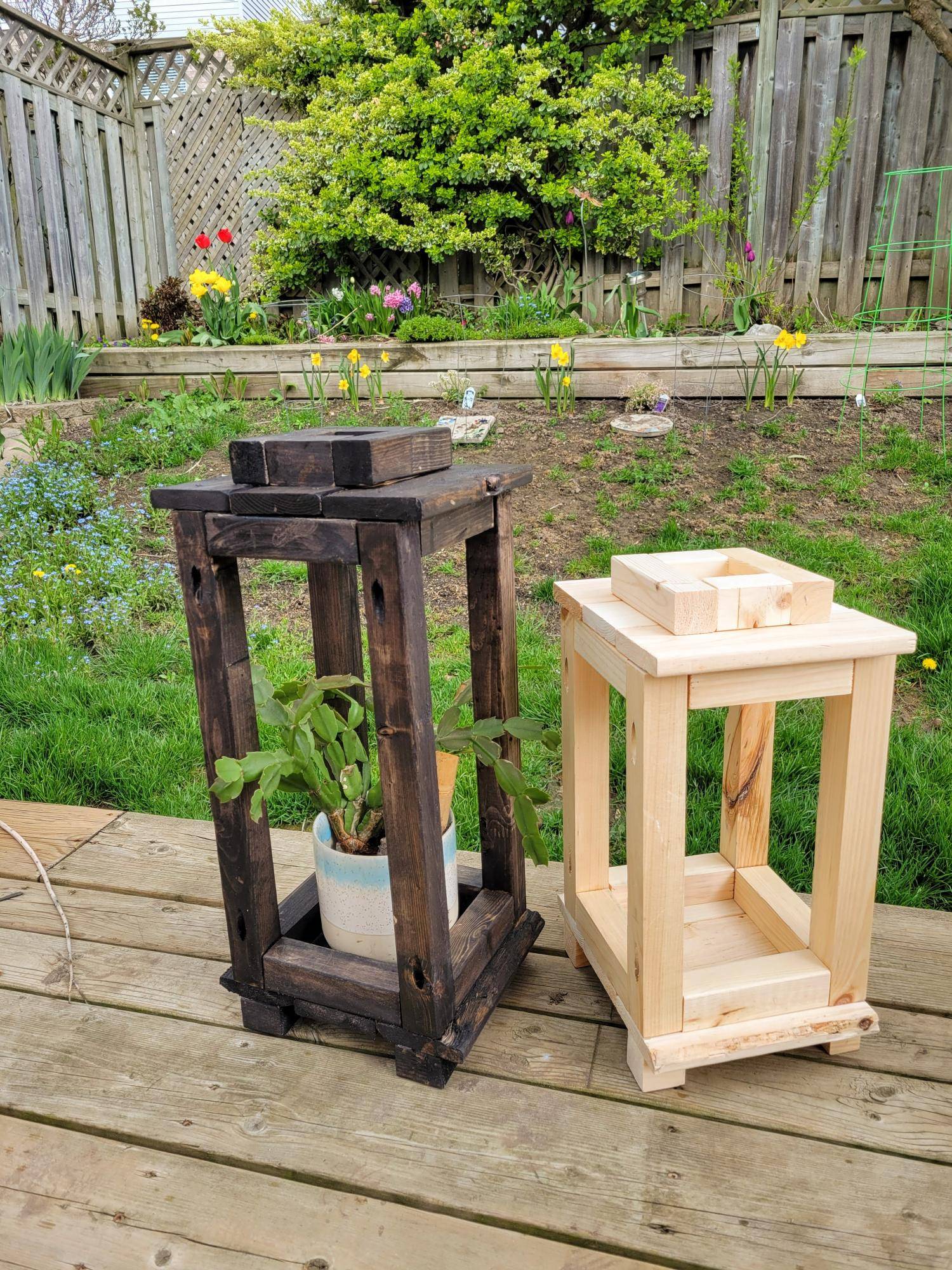 Two outdoor wooden lanterns.