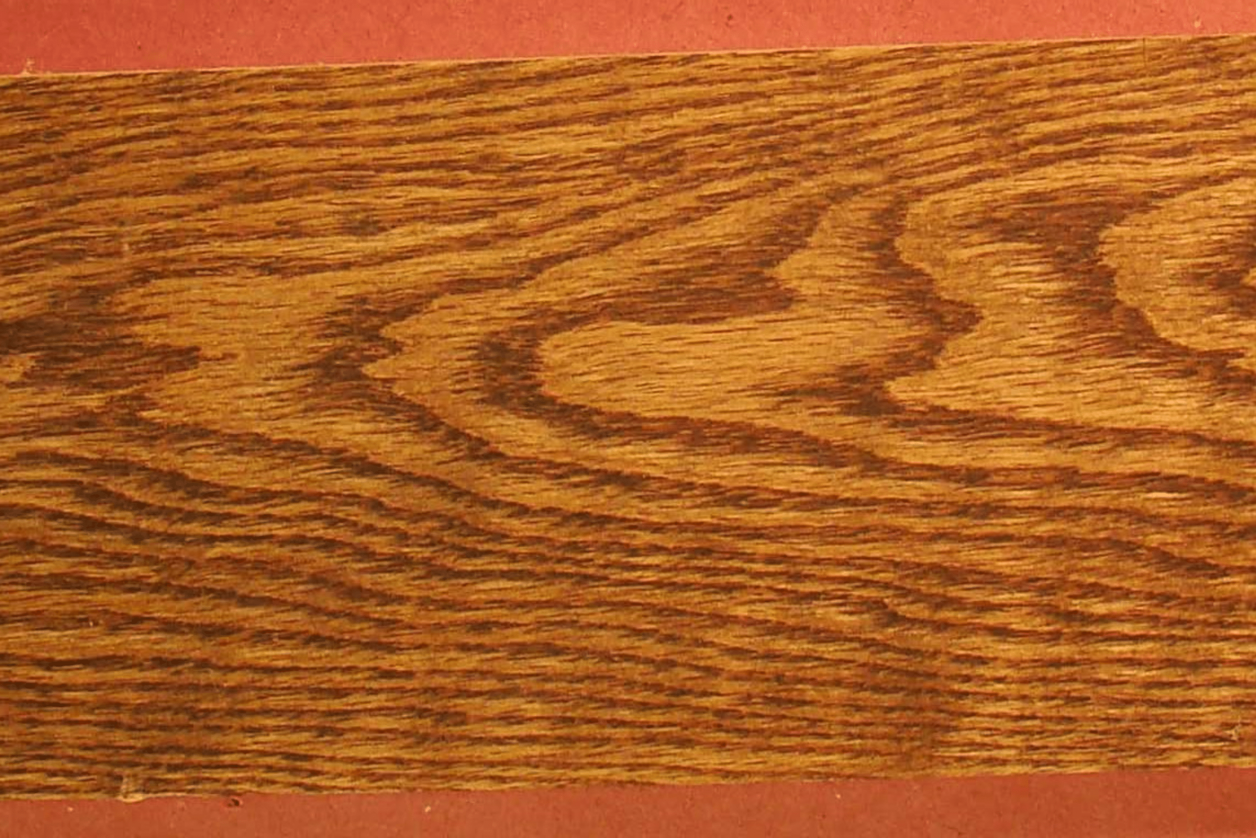 Plain sawn wood face with grain.