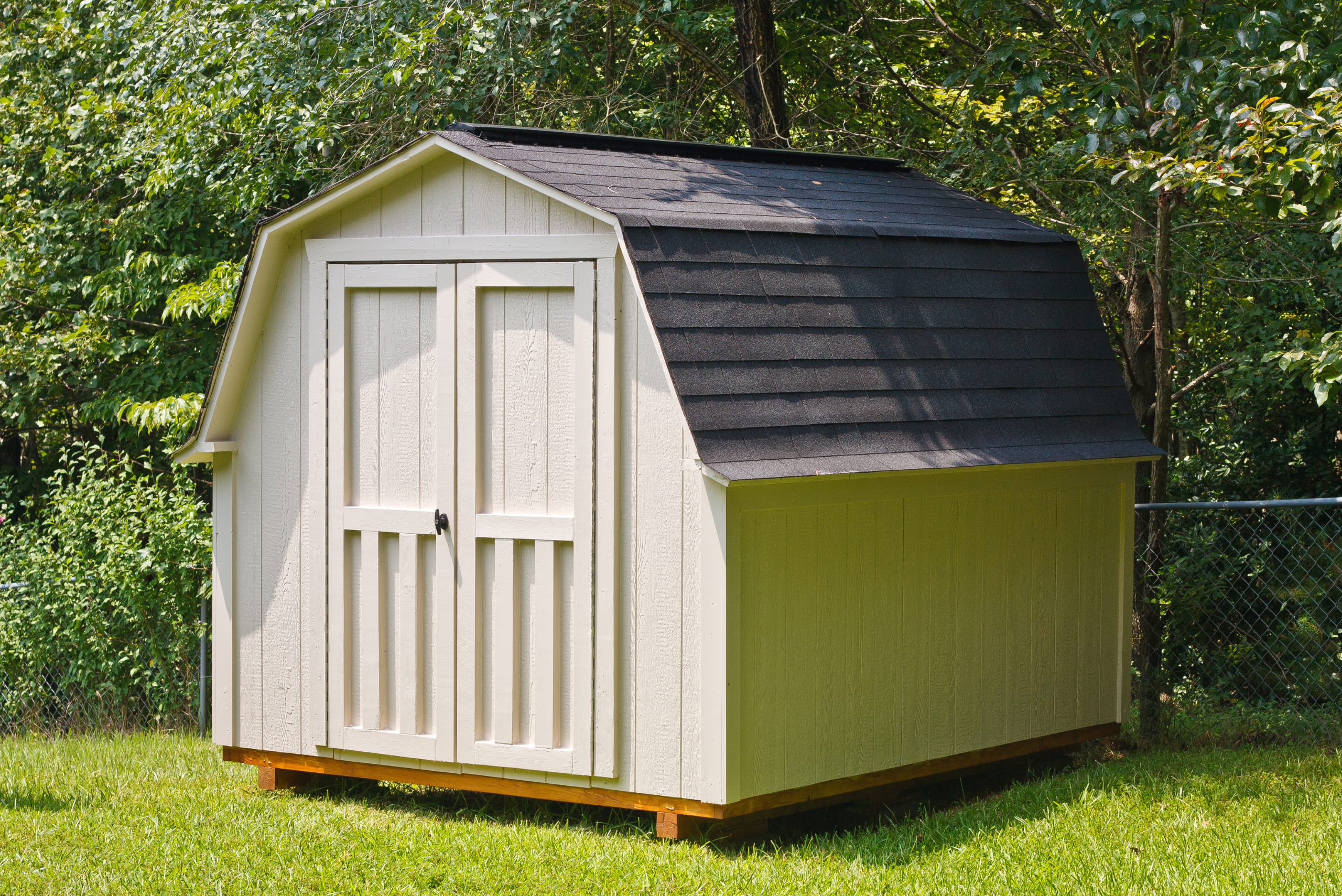 A shed on grass.