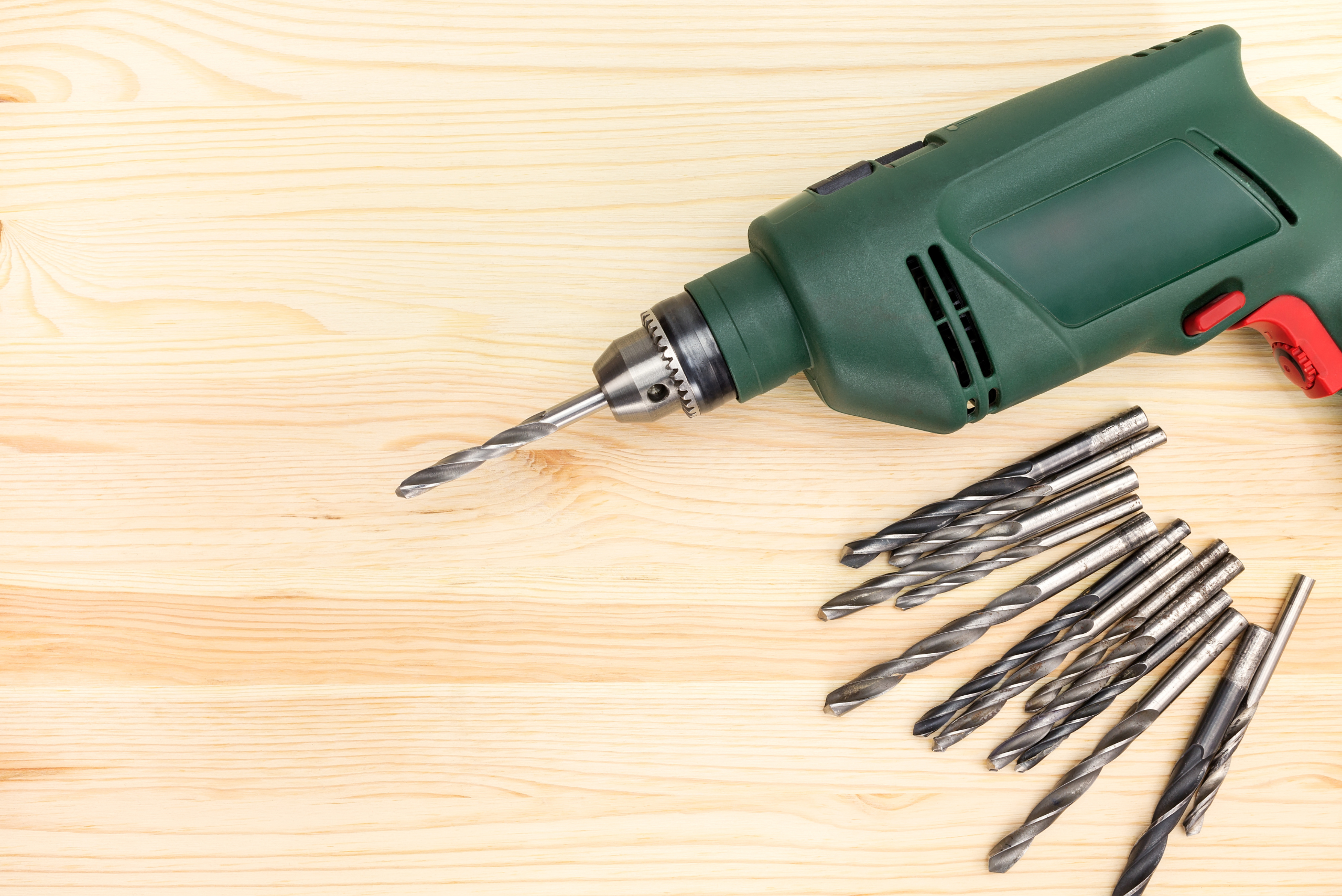 A green power drill.