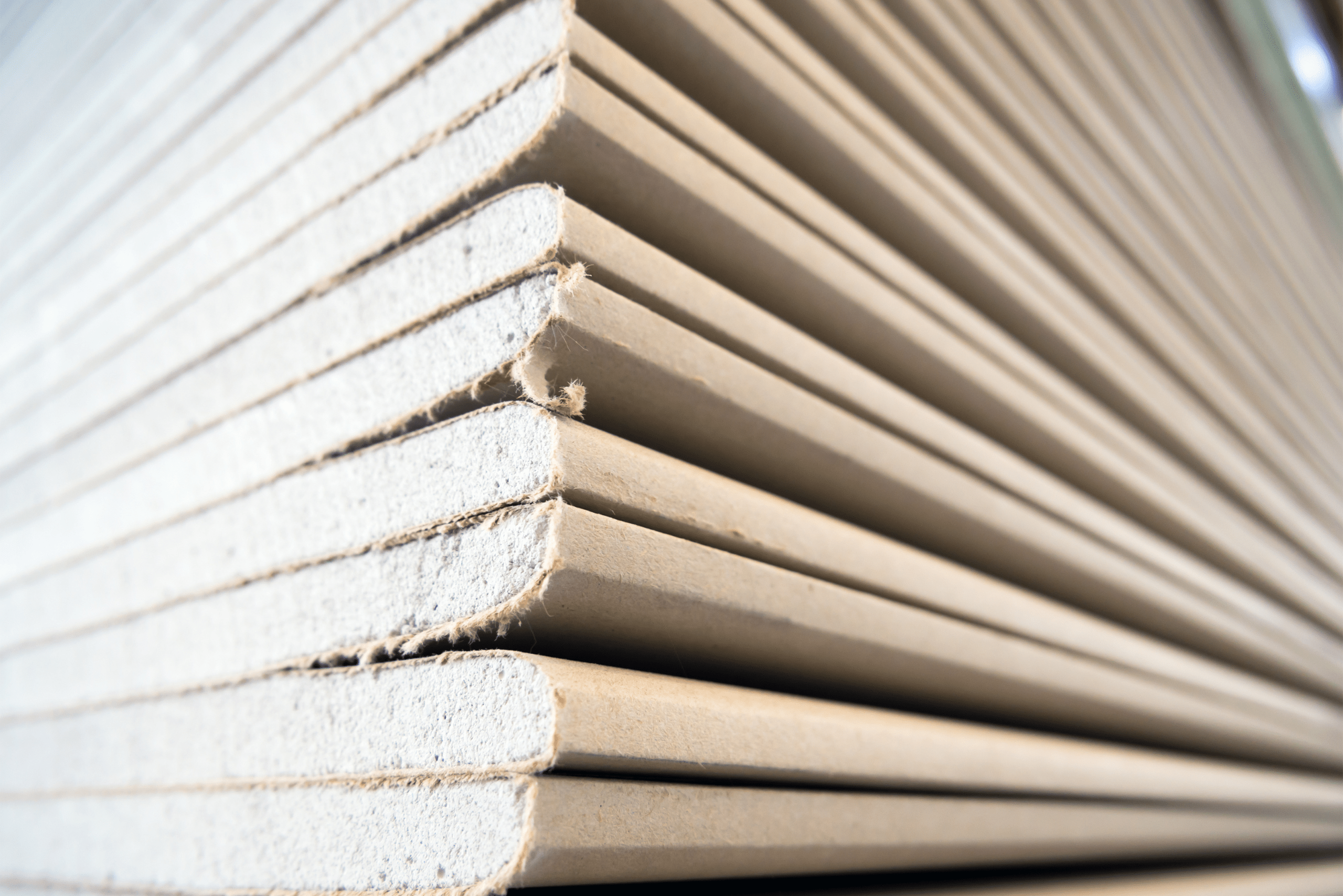 A stock of drywall sheets