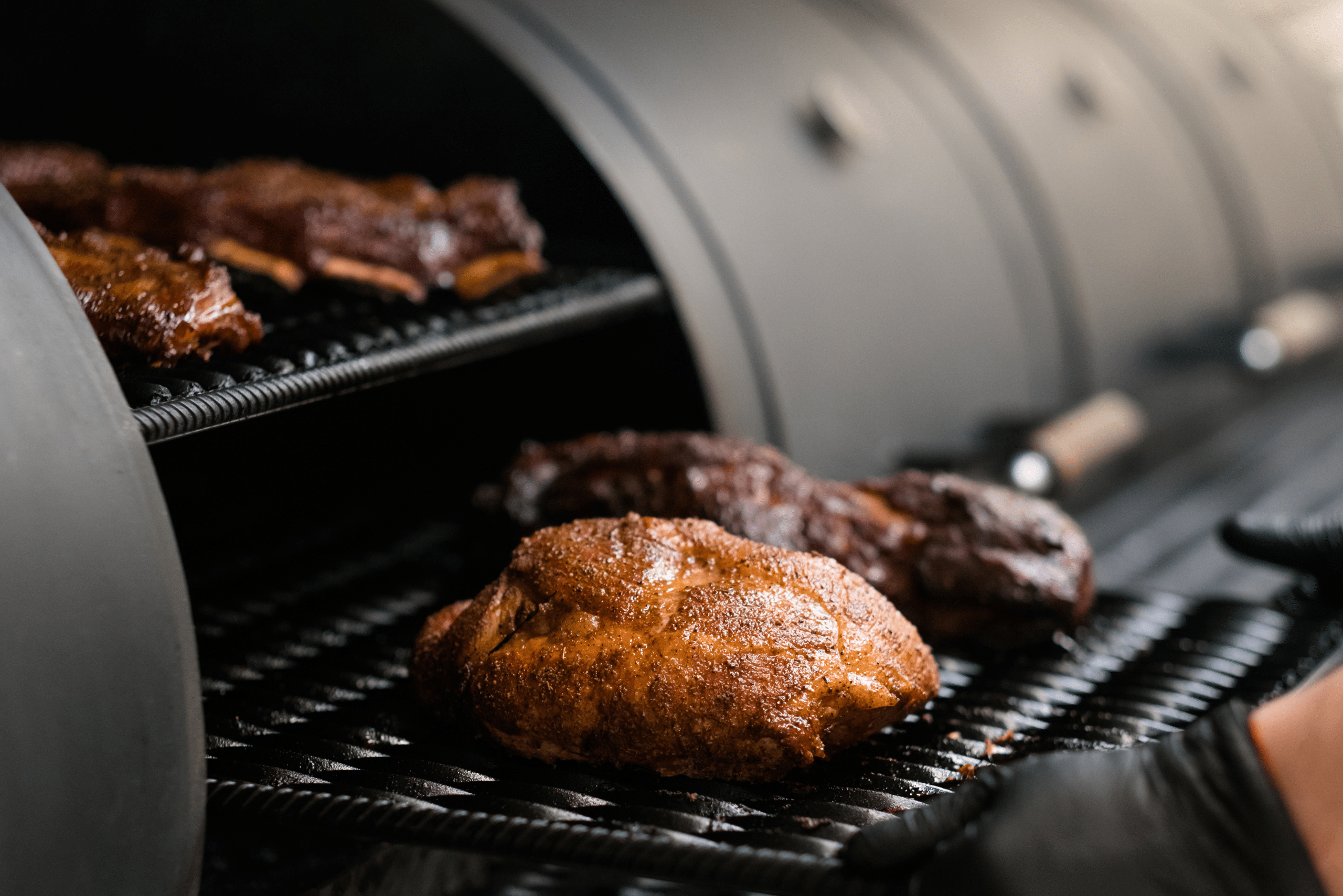 Cooked chicken on smoker.