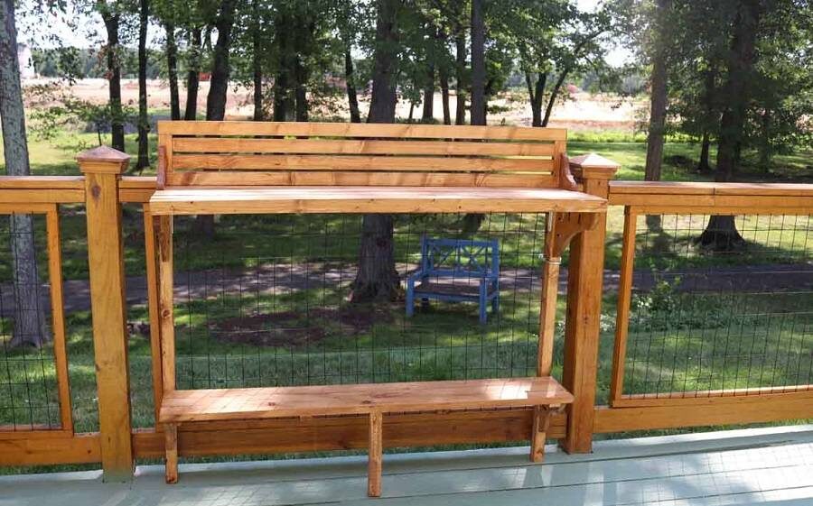 A DIY balcony bar made from wood in backyard.