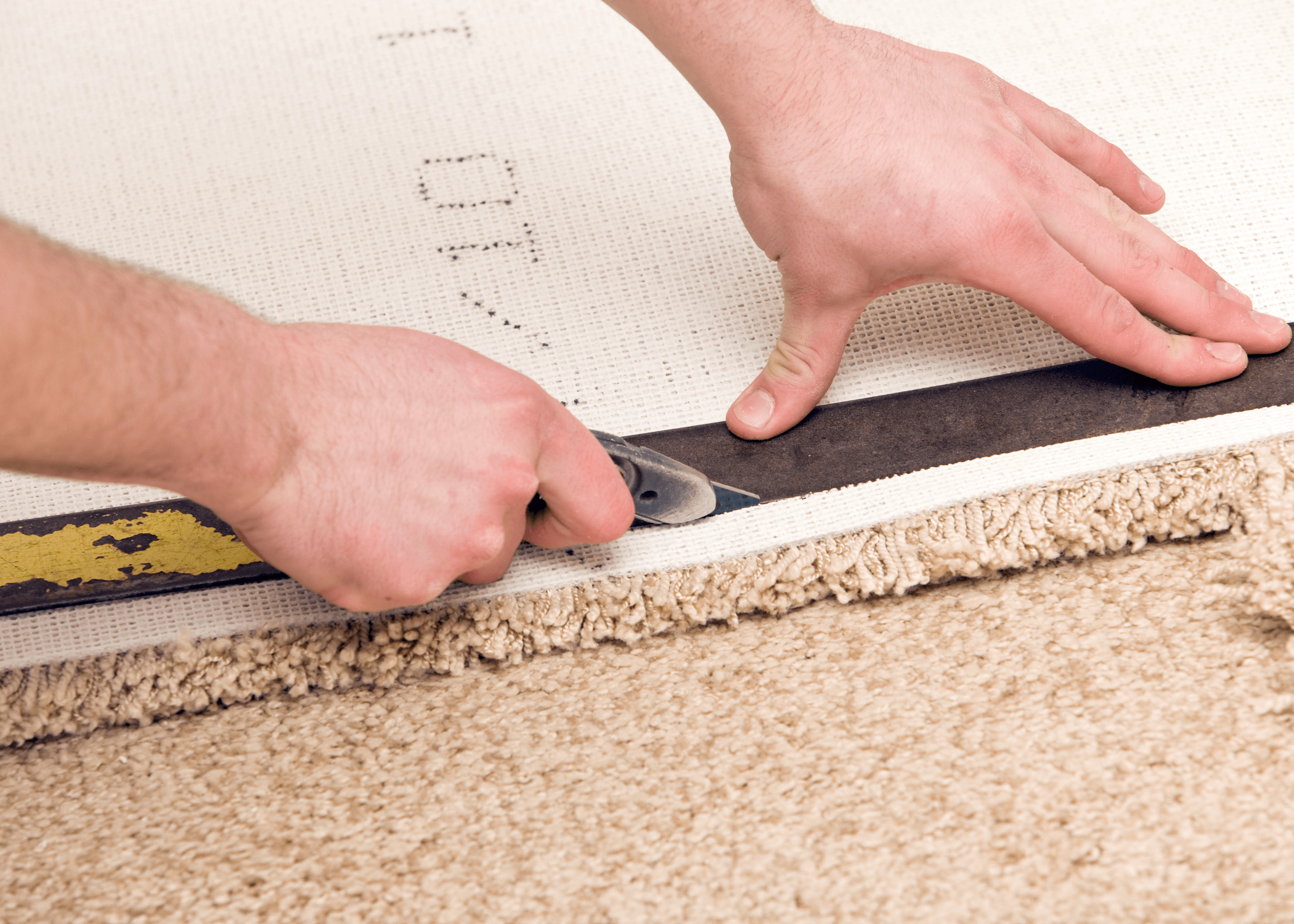 cutting carpet with a utility knife