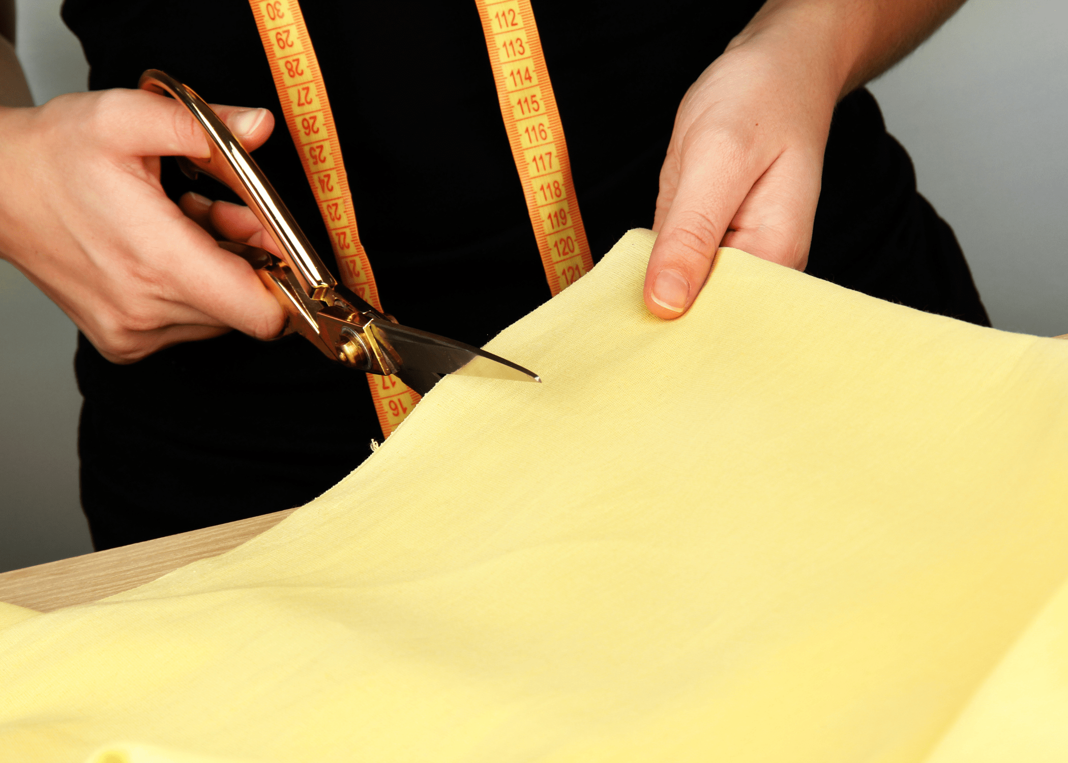 cutting fabric with scissors