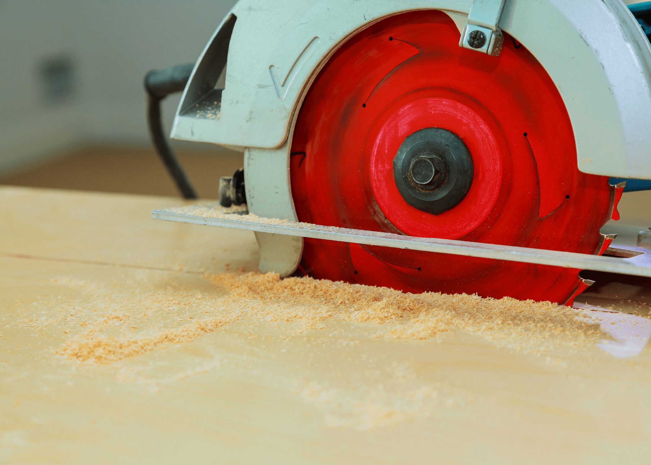 close up of a red circular saw