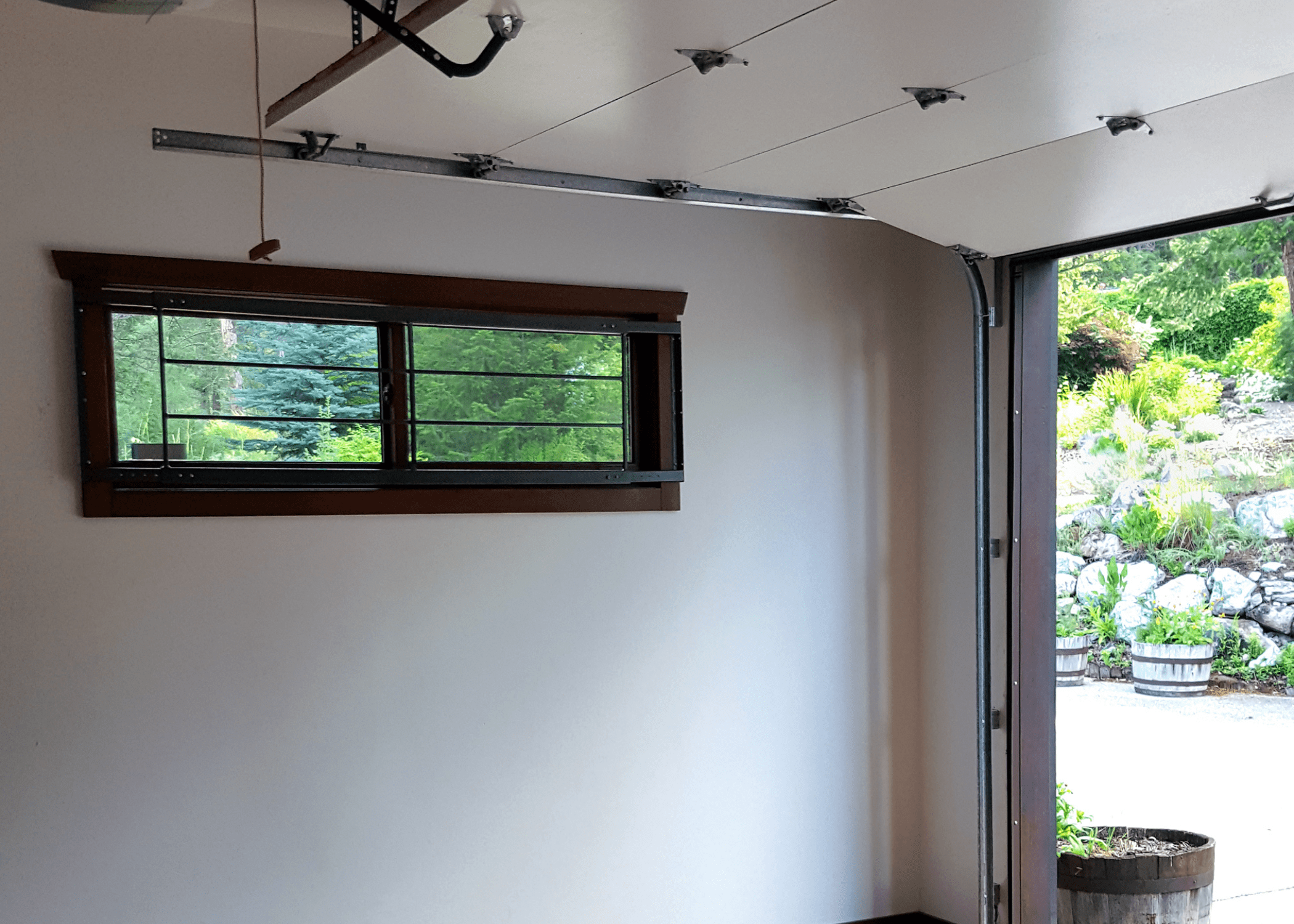 garage open and empty with one window