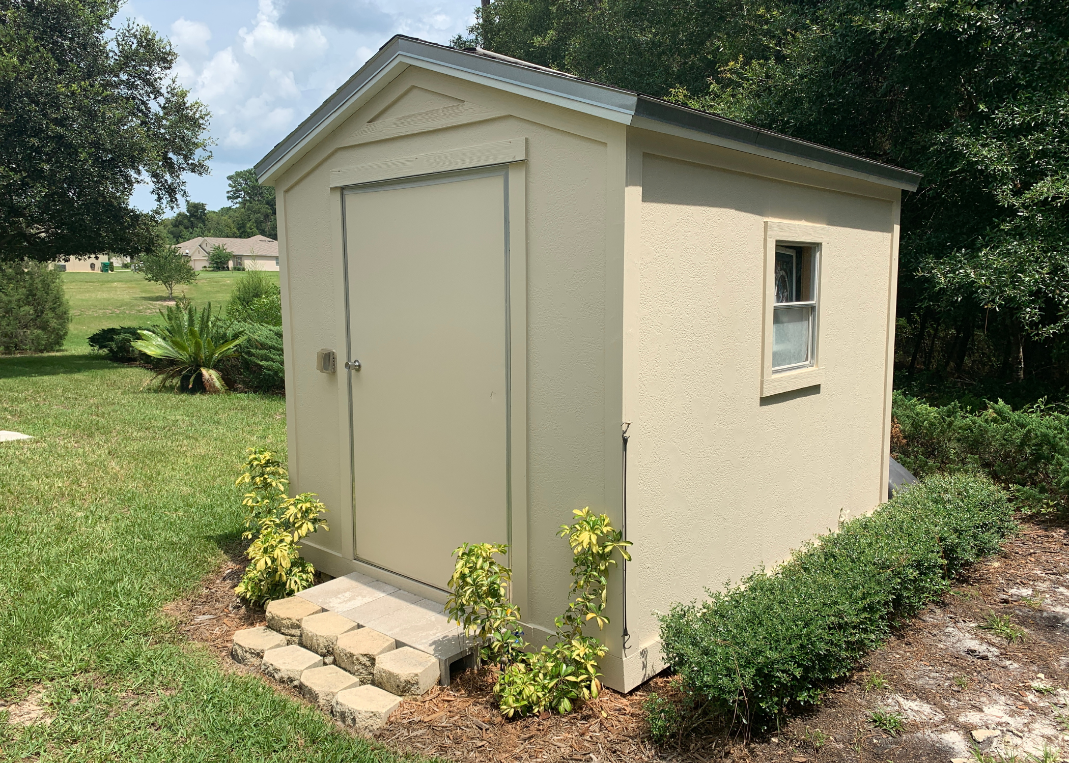 light green shed exterior