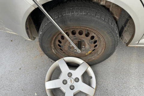 A breaker bar loosen tire lug nuts.