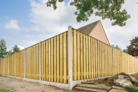 The exterior of a privacy fence of a home.