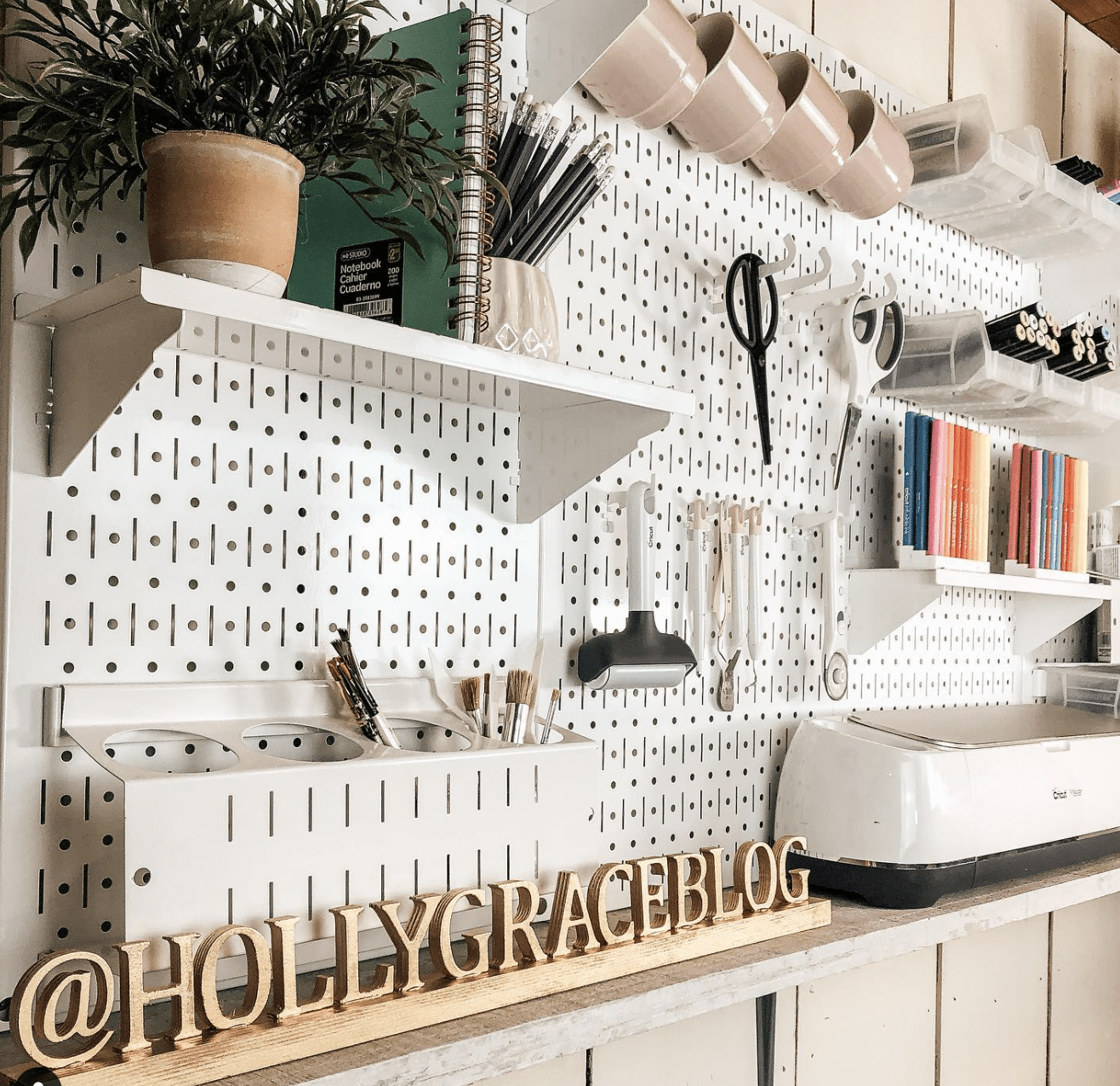 pegboard close up shot with tools in craft room