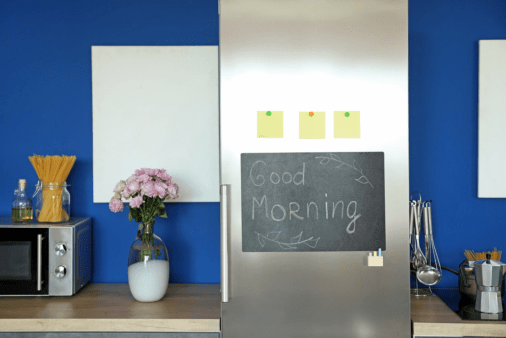 Chalk and chalk board in a kitchen.