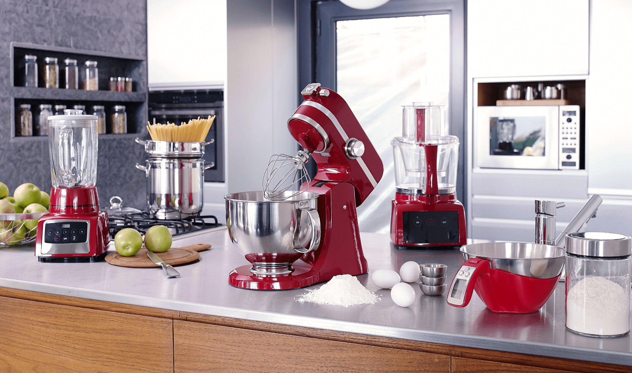 Various kitchen appliances on a countertop.