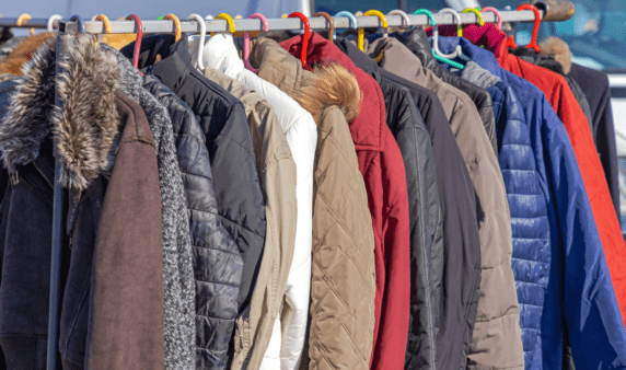 A rack full of winter coats.