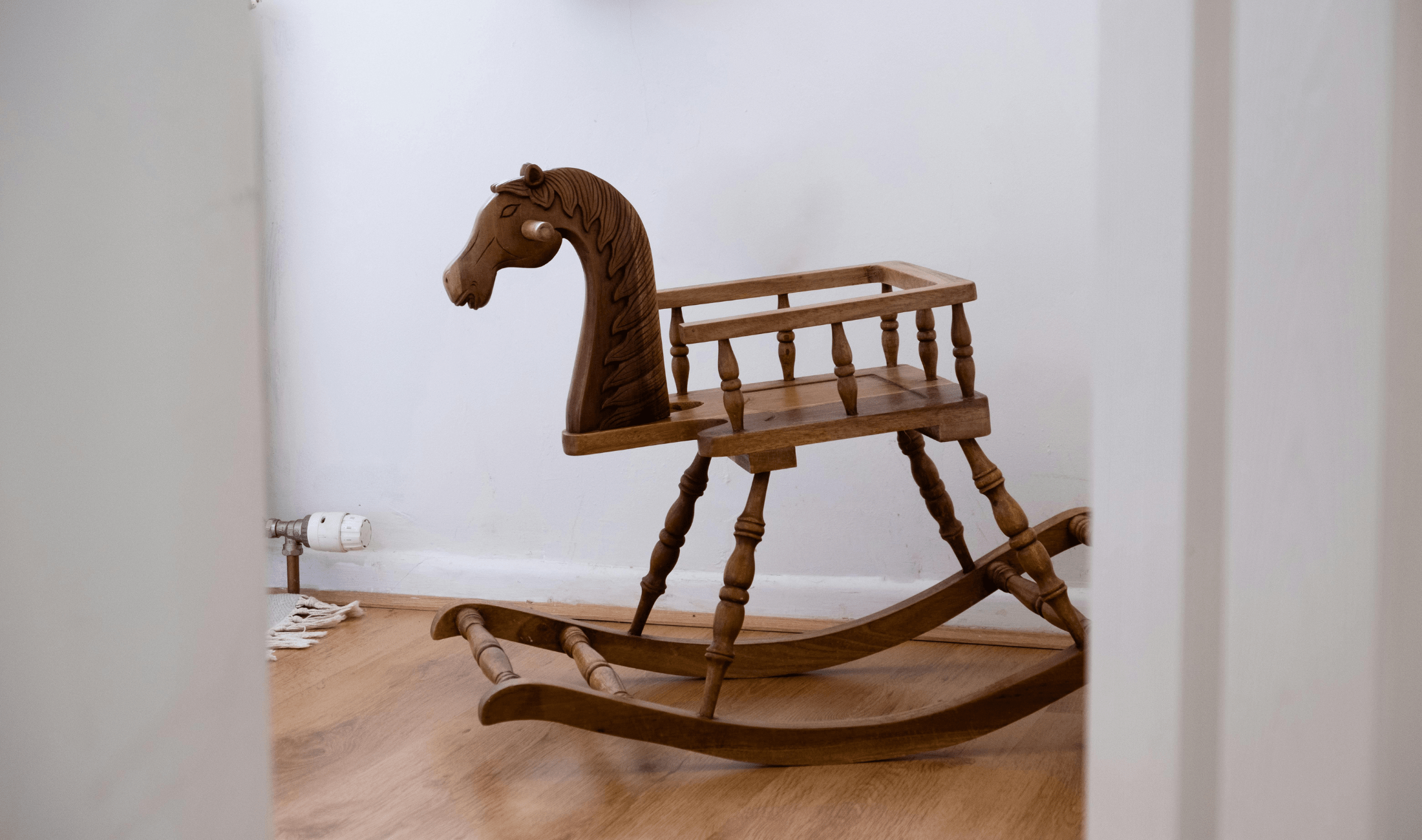 An old basinette-rocking-horse combo.