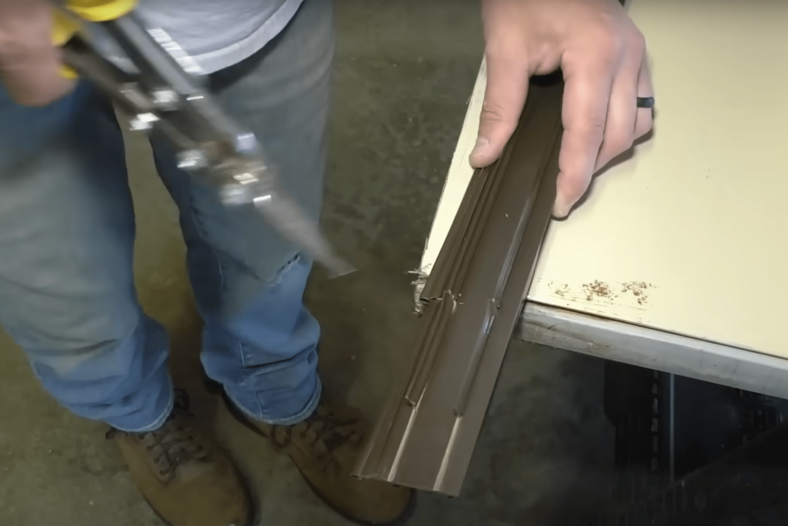 Cutting seal to length.