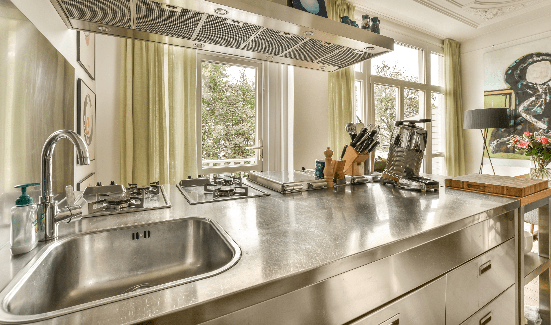 A stainless steel kitchen workspace.