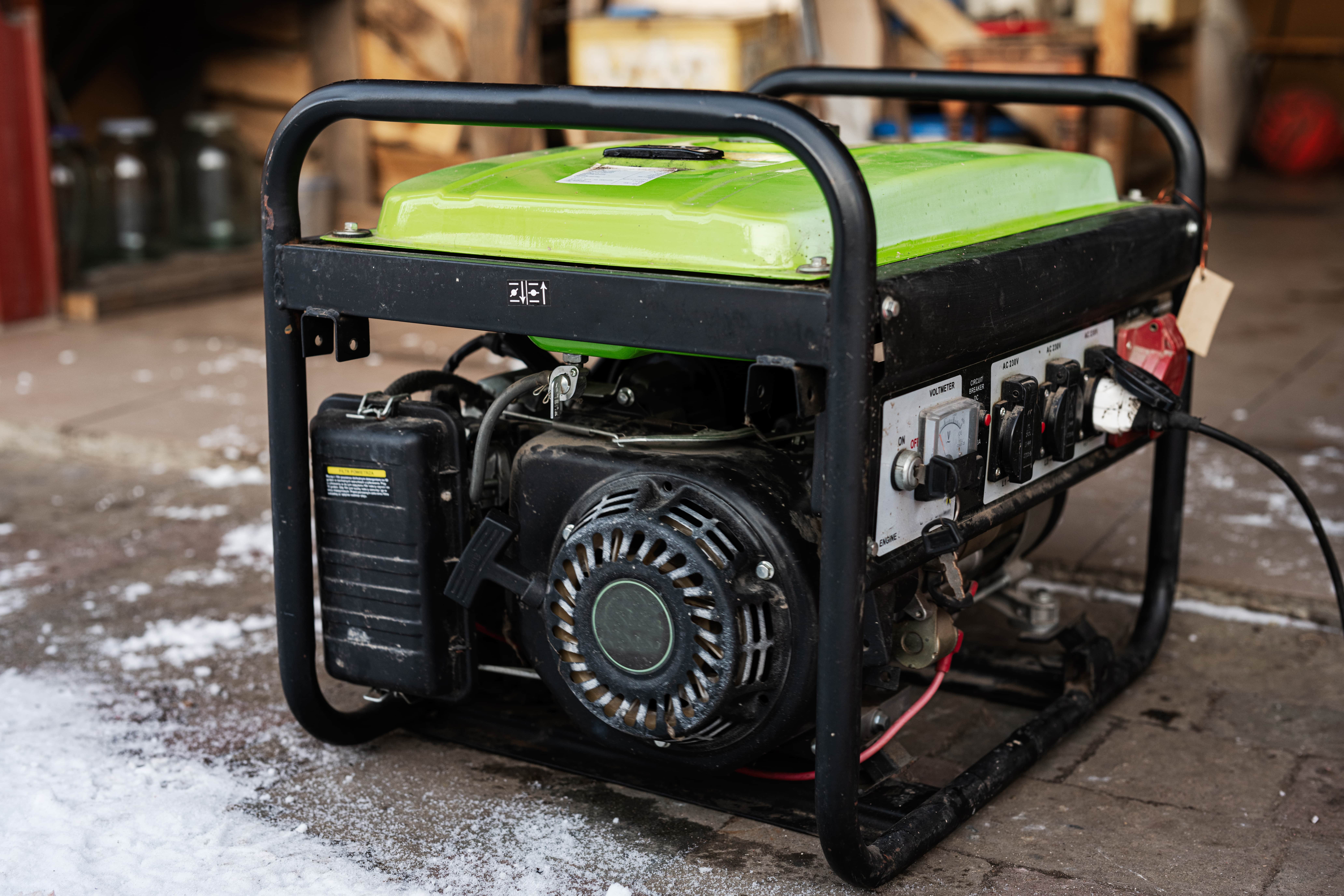 A large generator sitting in a garage.