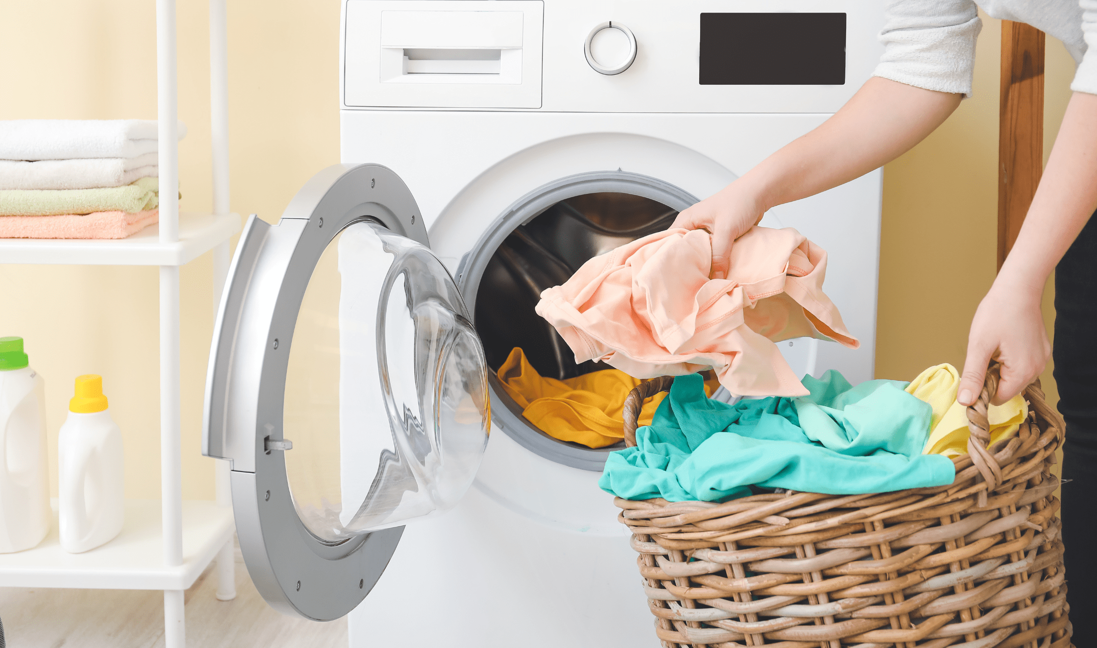 A person unloading their dryer.
