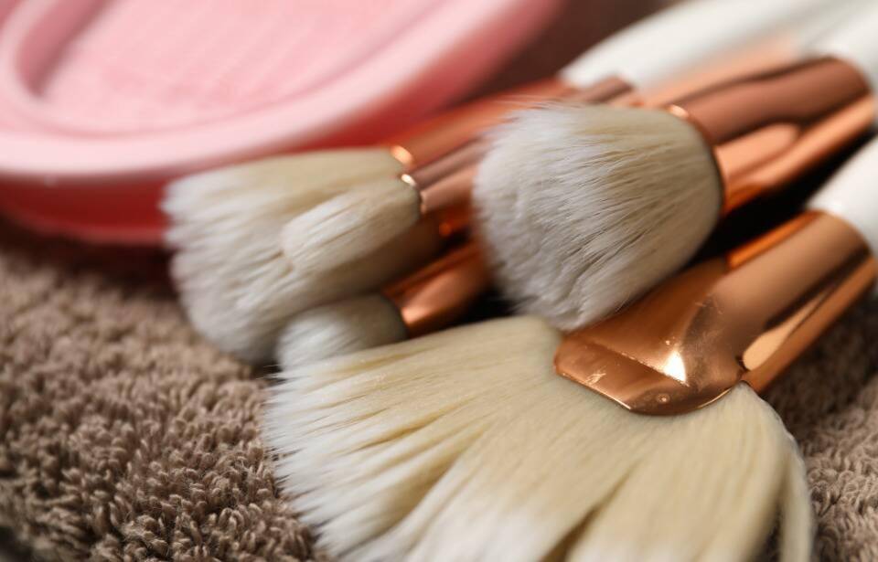 A closeup of some makeup brushes.