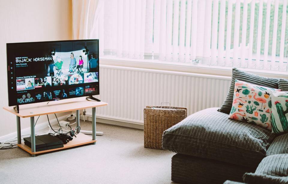 A living room, the tv on a small table.