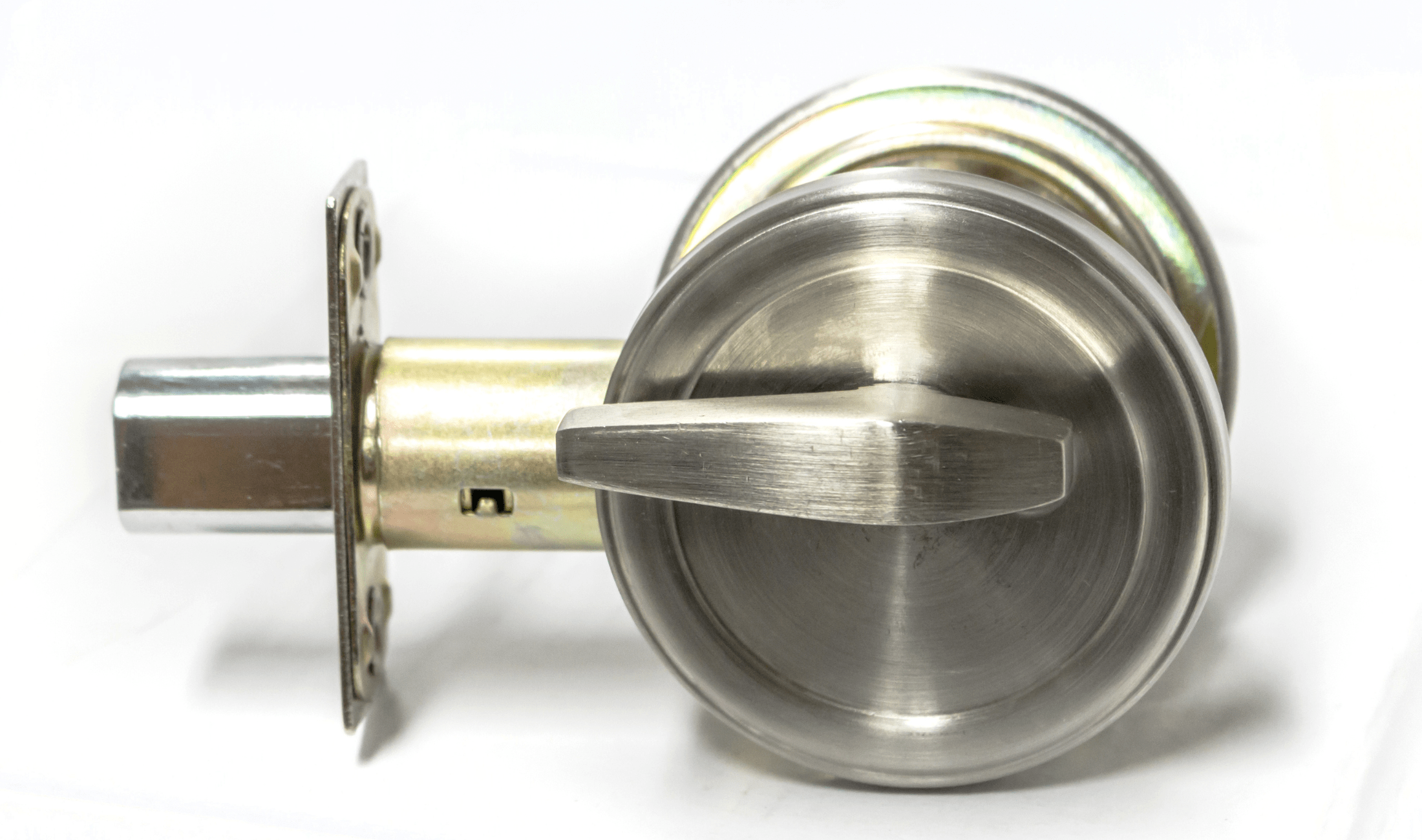 A deadbolt outside of a door, showing the mechanism.