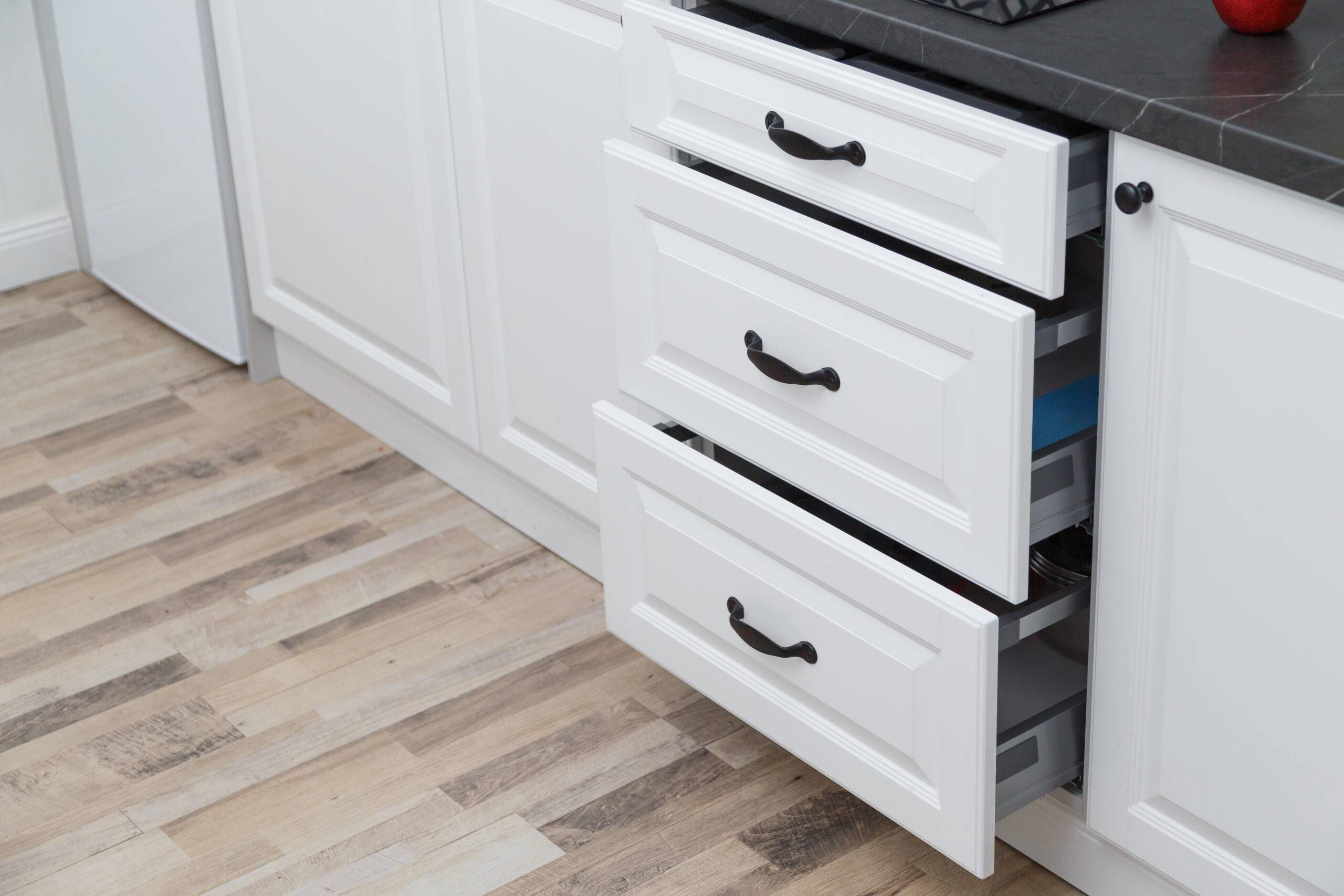 Kitchen furniture. White kitchen drawers.