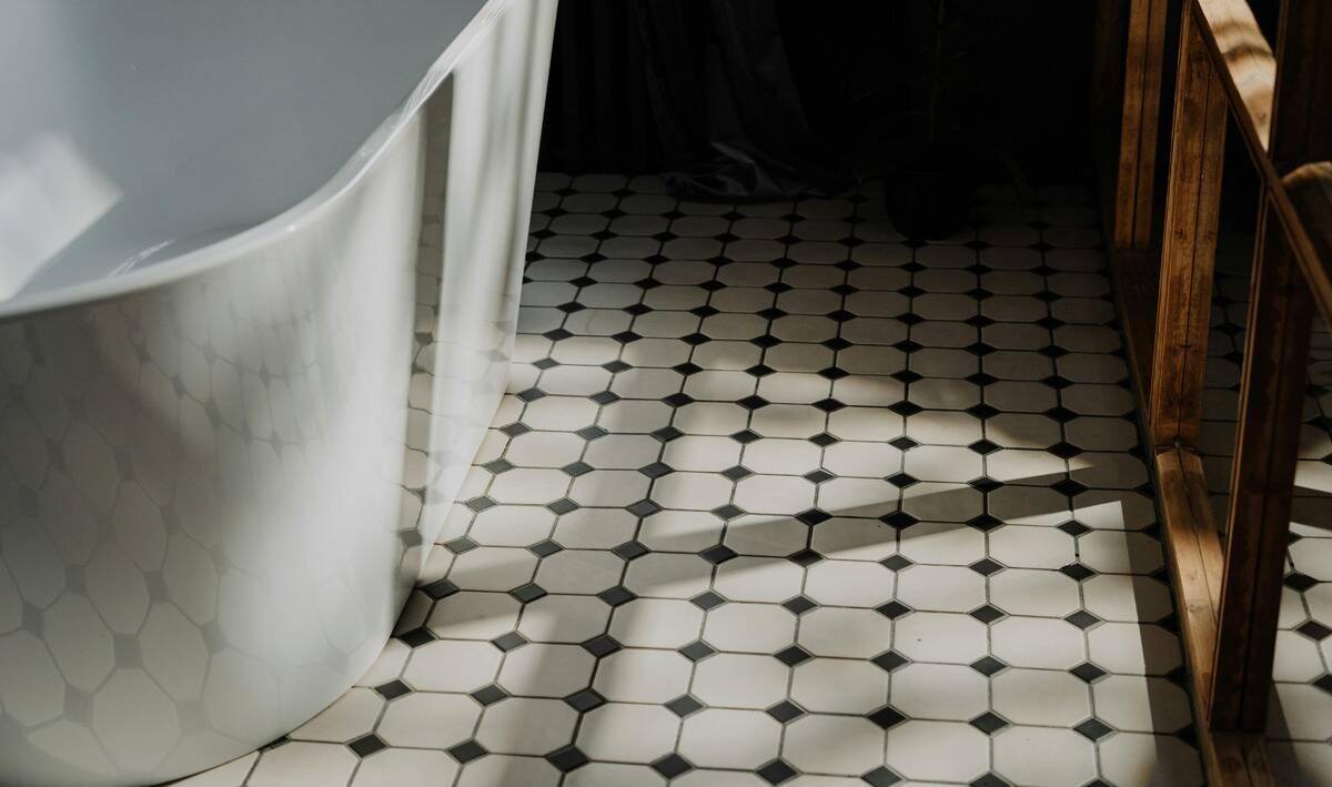 A close photo of a bathroom's tile floor.