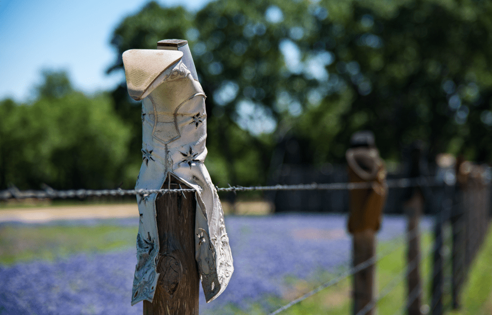White boot on a fencepost.
