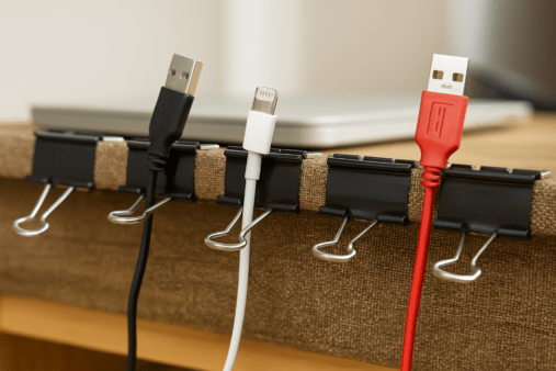 Binder clips used to organize different cords.
