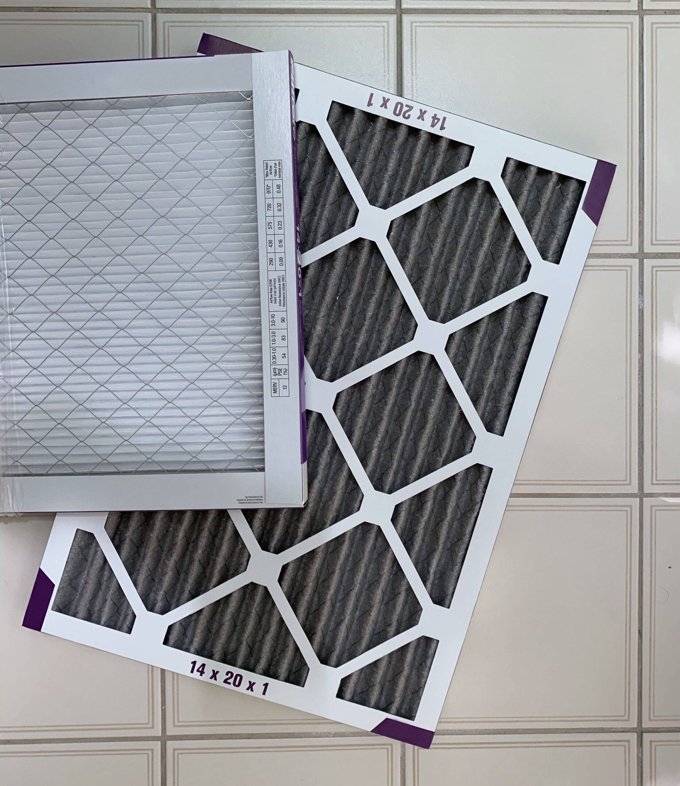 A dirty and clean furnace filter.