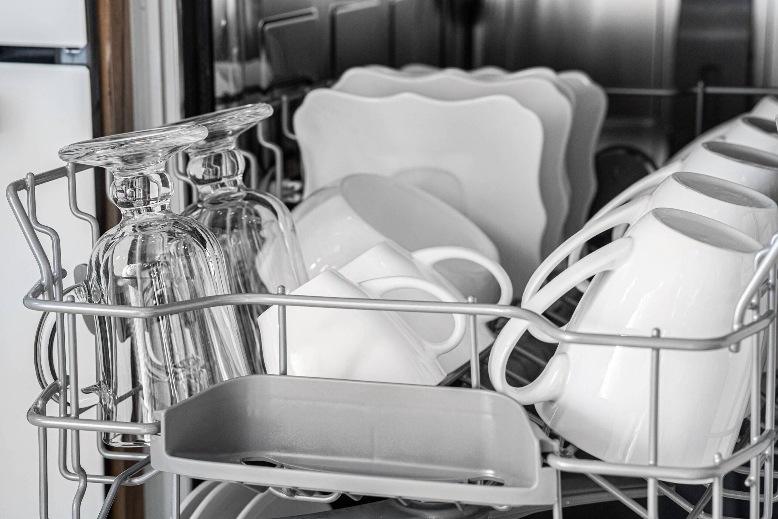Clean dishes in dishwasher.