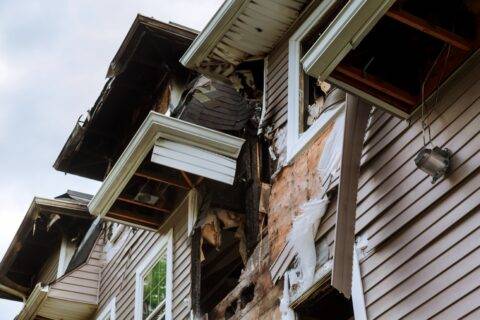 Damage to the structure of a house after a fire.