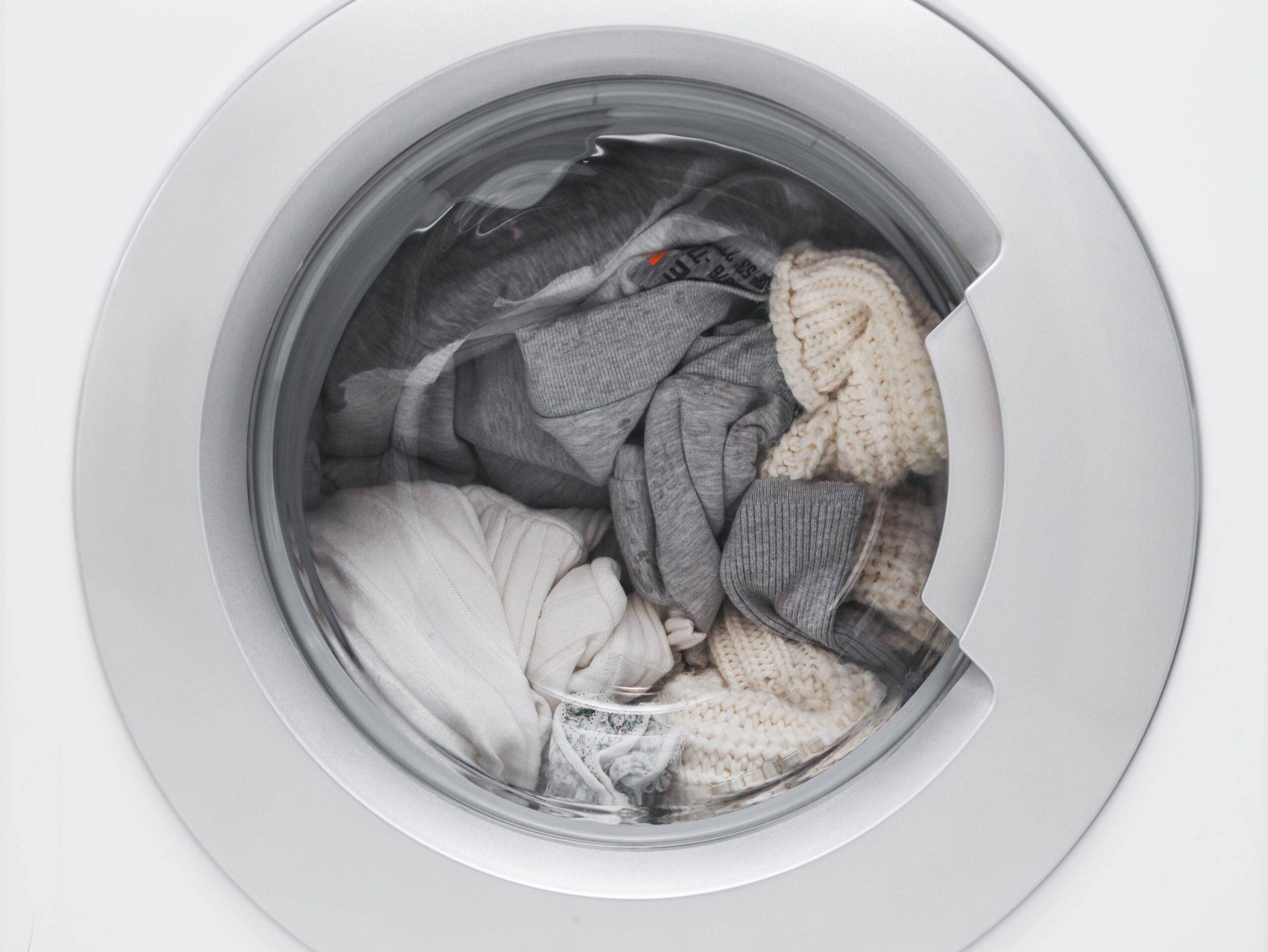 Laundry inside of a washing machine.