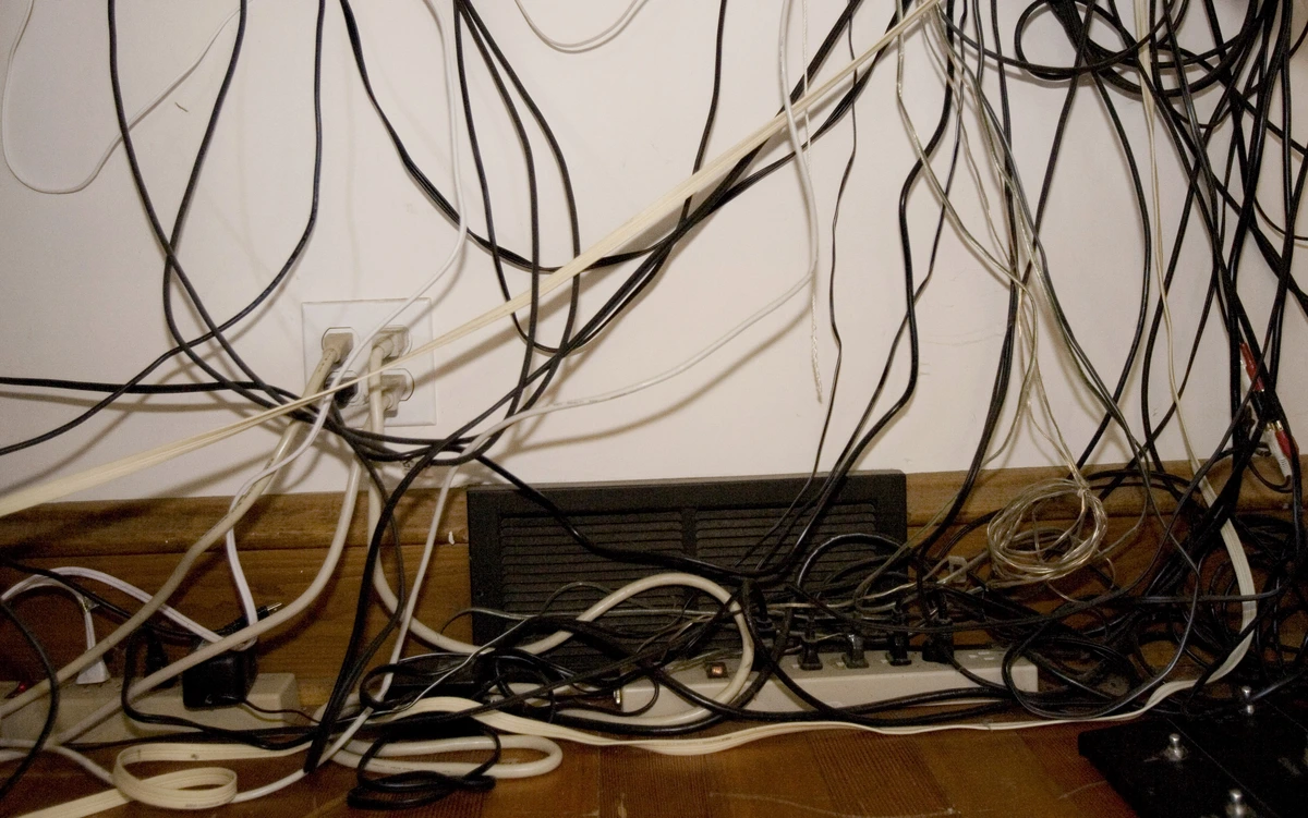 An image of a bunch of loose wires that are connected to an extension box. 