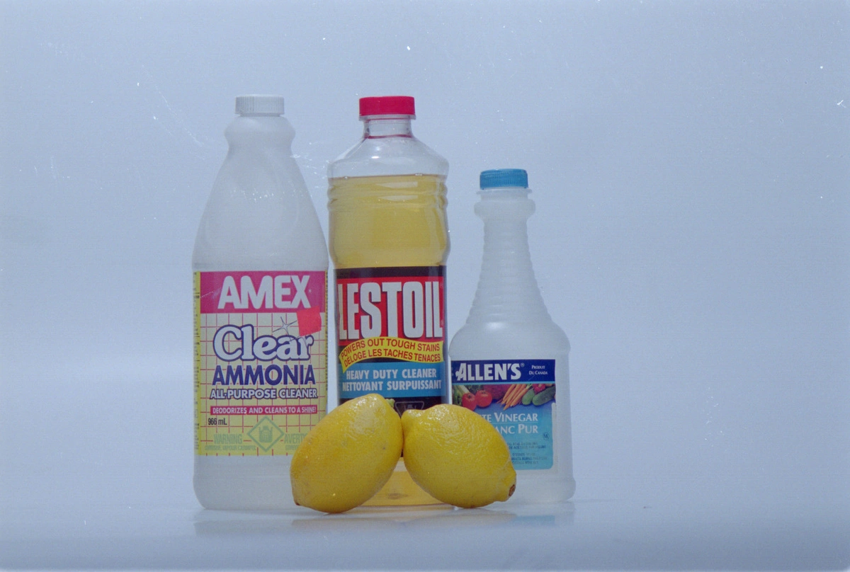 Pic of lysol, ammonia, lemons and vinegar.