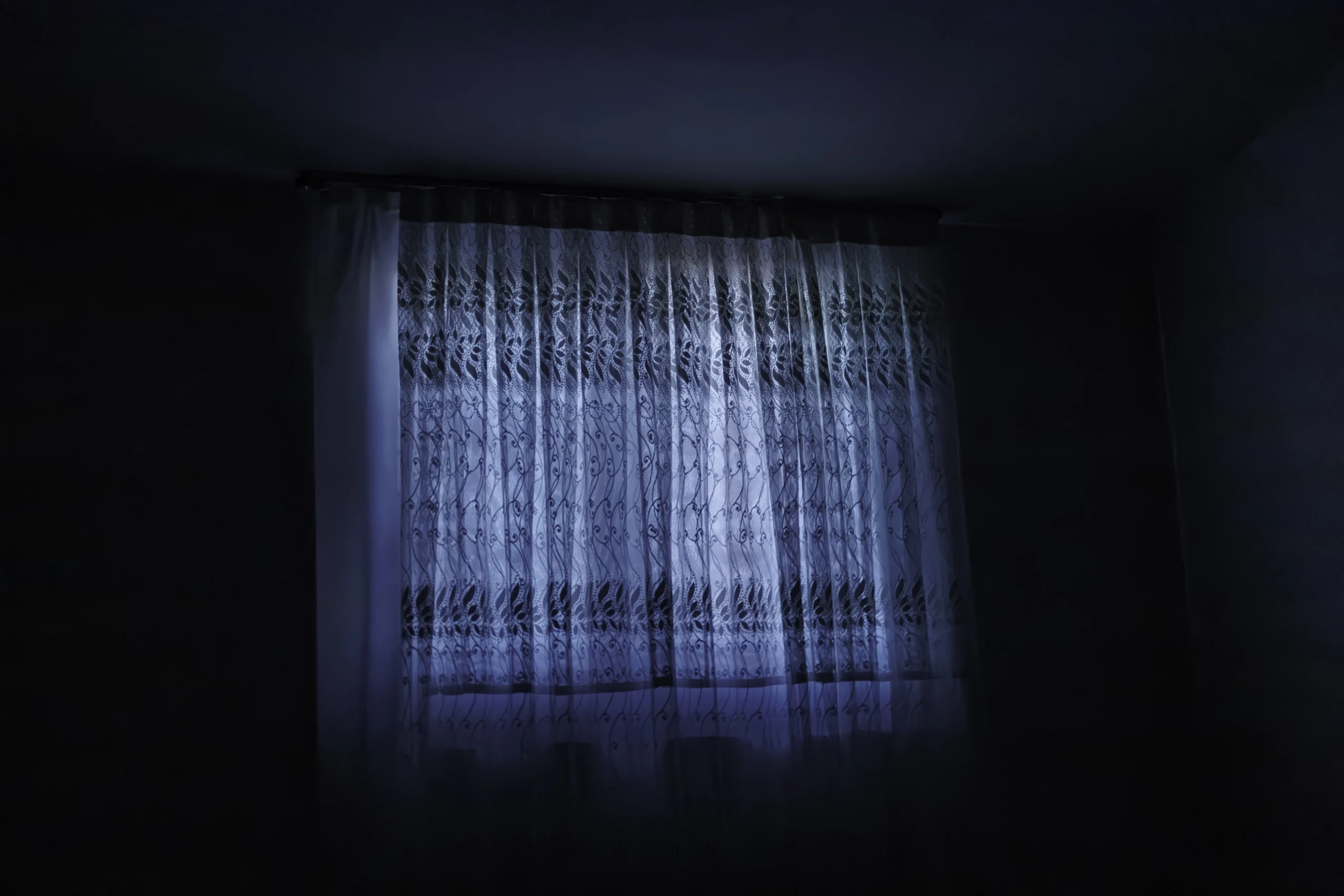 A closed curtain at night to cut out outside light. 